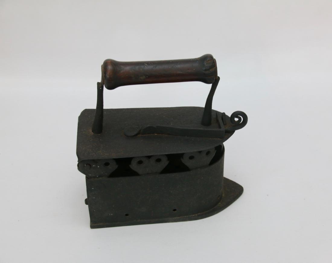BLACKSMITH MADE CHARCOAL IRON: MONKEY TAIL LATCH - DECORATED CUTWORK - EARLY 18TH CENTURY . 8 1/2"