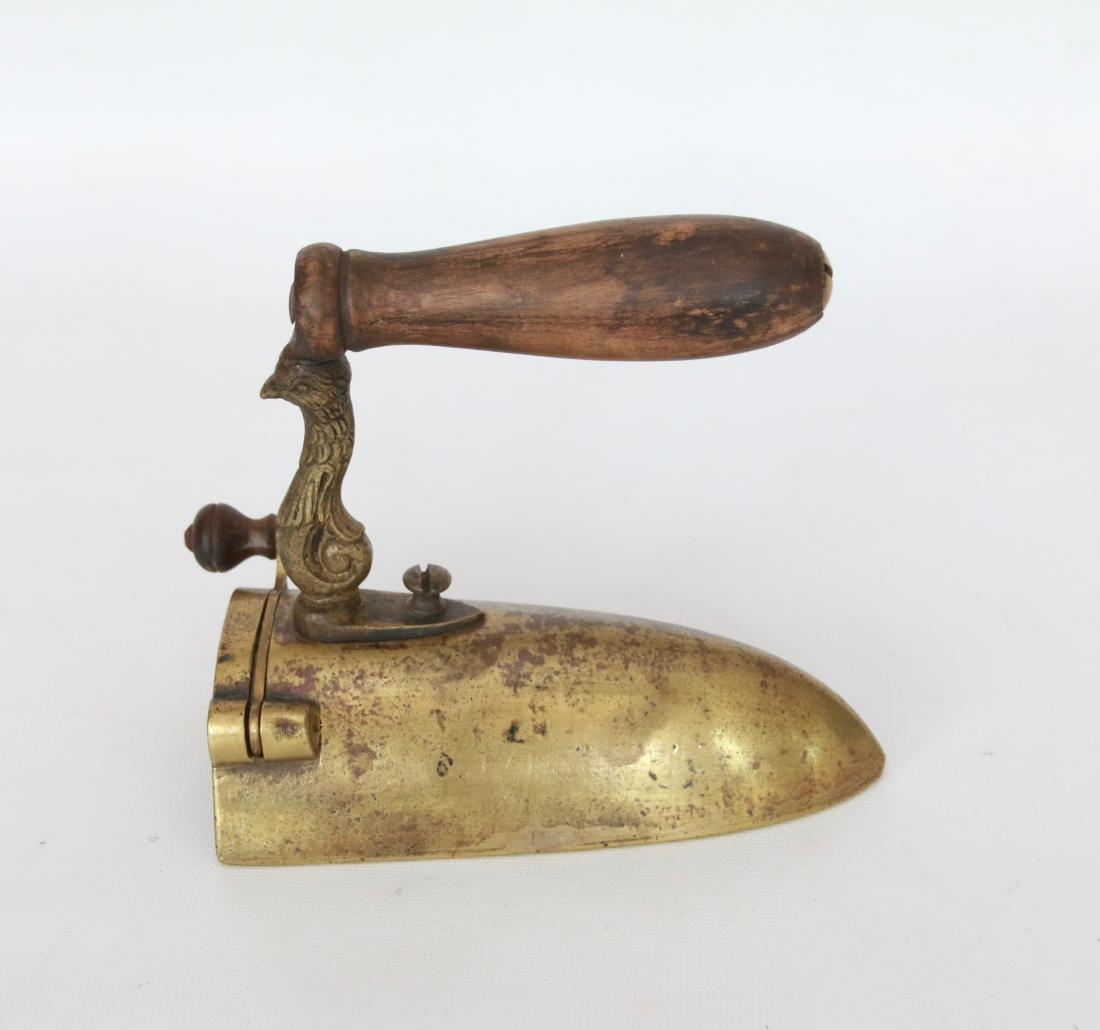 SLUG IRON: BRASS OX TONGUE IRON WITH SWING GATE - FIGURAL BIRD POSTS . 5 1/2"