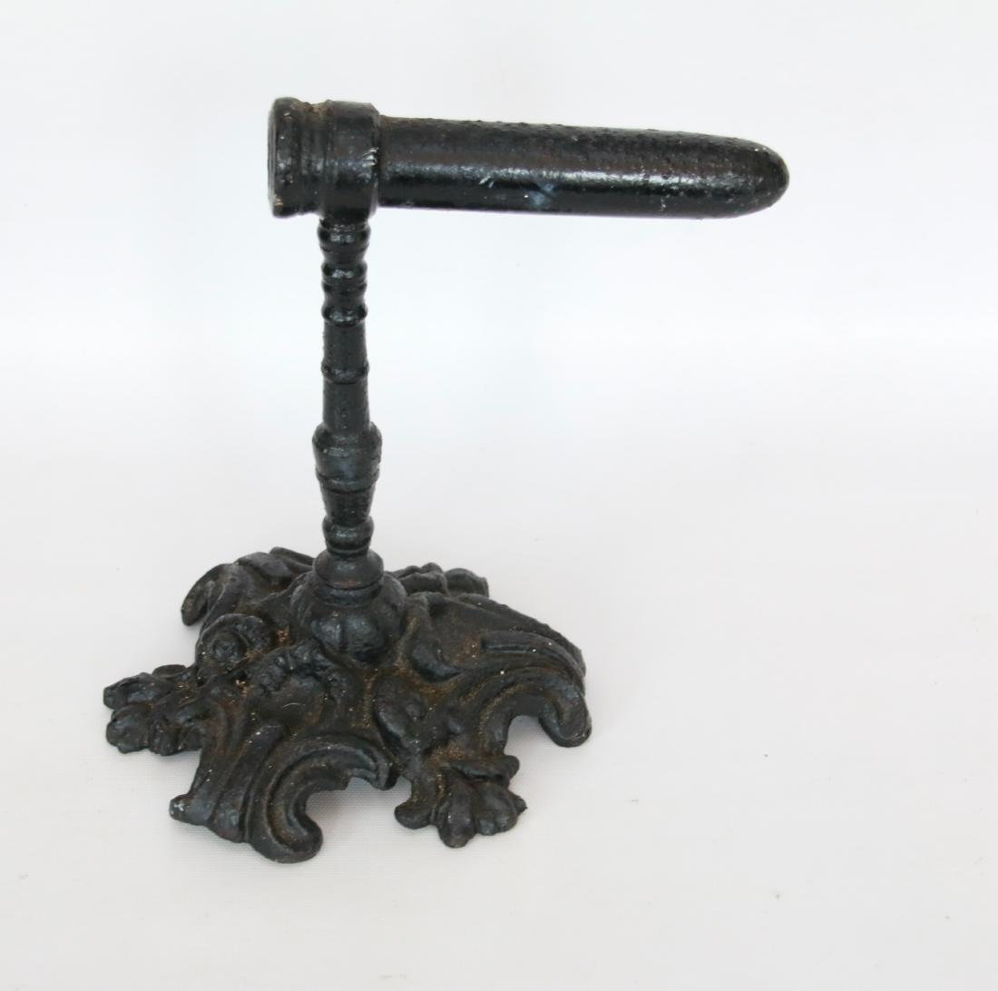 GOFFERING IRON: CAST IRON SINGLE BARREL GOFFERING IRON - TURNED POST - ORNAMENTAL BASE . 6" BARREL - 8"