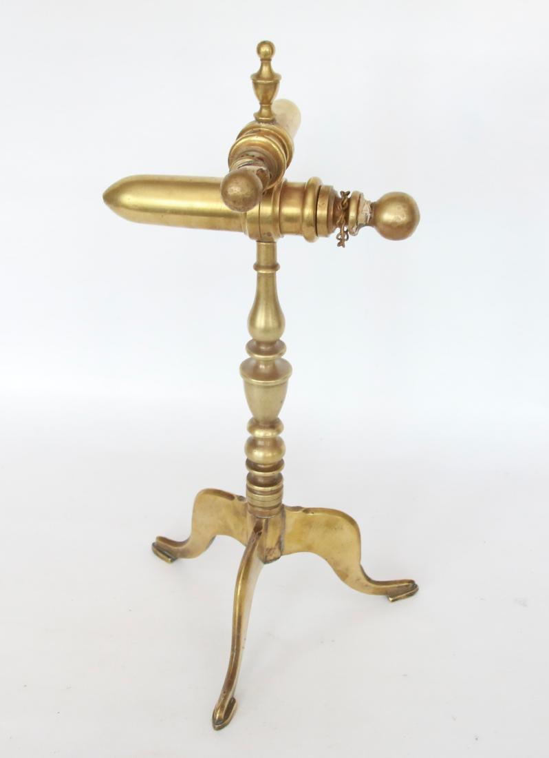 BRASS GOFFERING IRONS: DOUBLE GOFFERING IRON, TRIPOD SHOE FEET, TURNED POST . 4 1/2" AND 3" BARRELS - 14" H