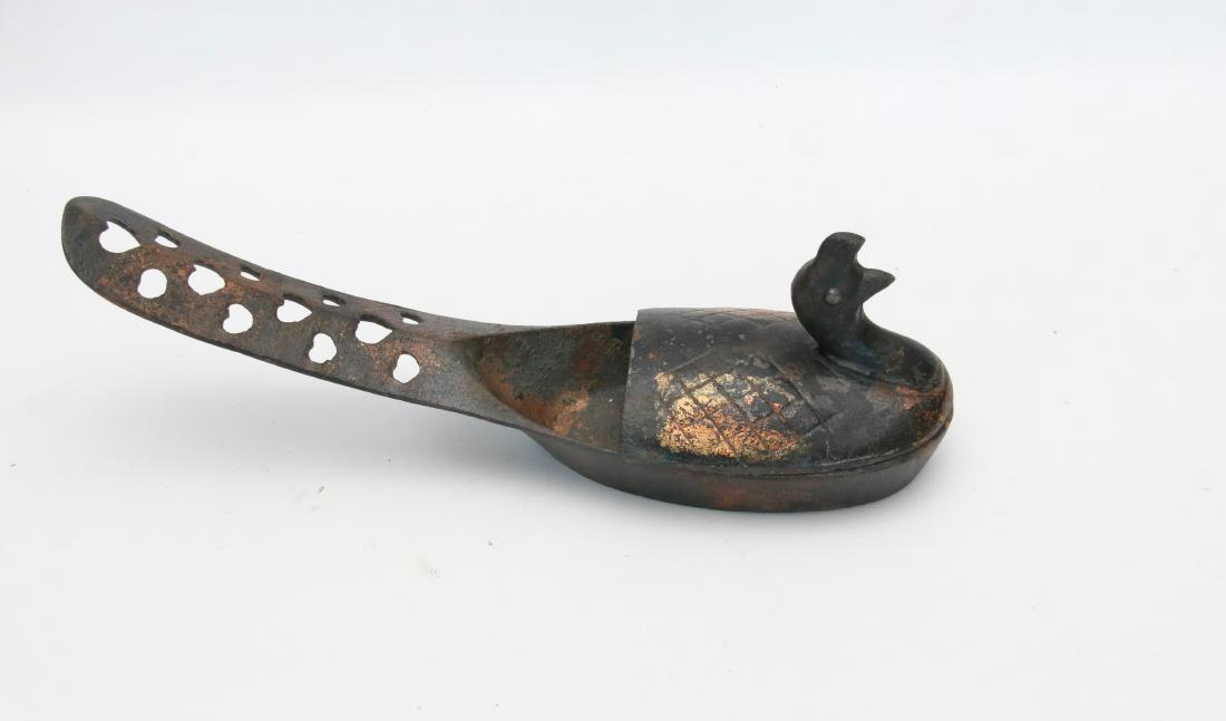 CAST IRON CHINESE SILK IRON: IN THE FORM OF A PEACOCK . 12" L