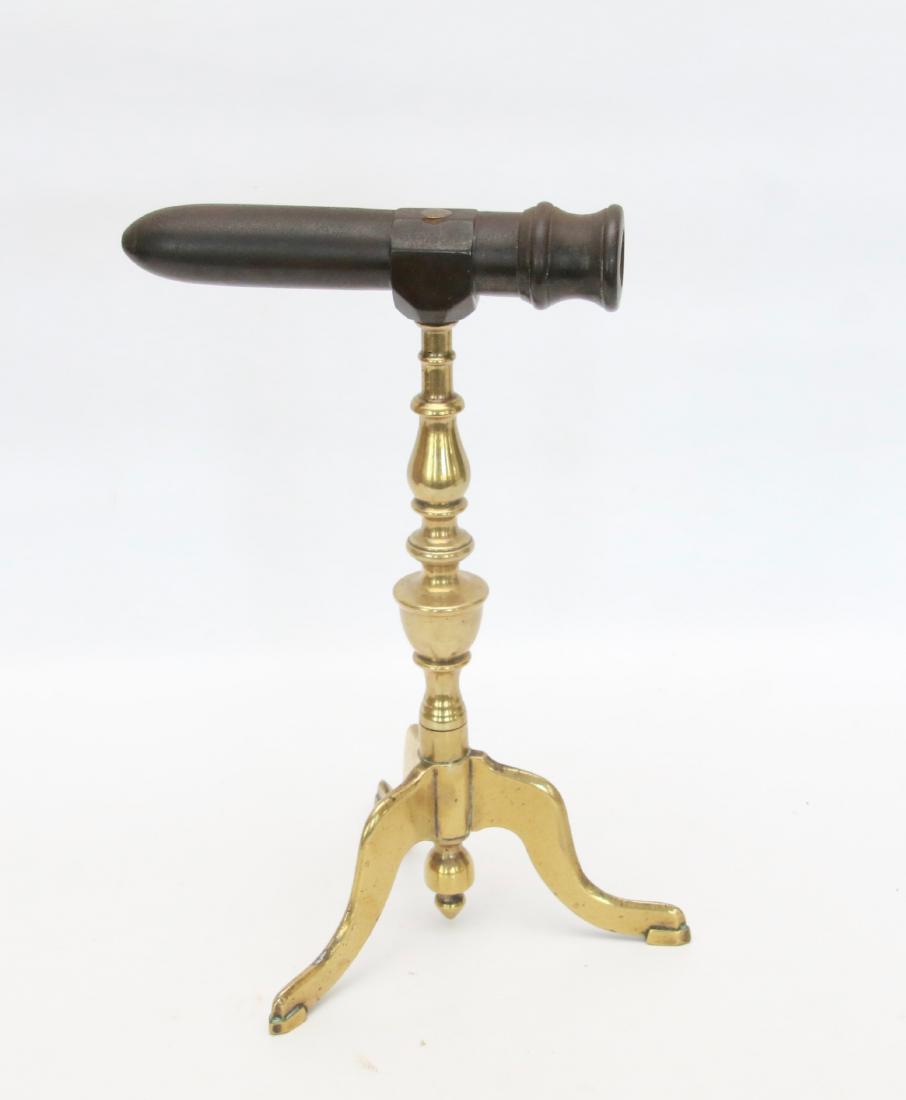 SINGLE BARREL GOFFERING IRON: BRASS TURNED POSTS, TRIPOD QUEEN ANNE FEET, AND IRON BARREL . 6 3/4" BARREL