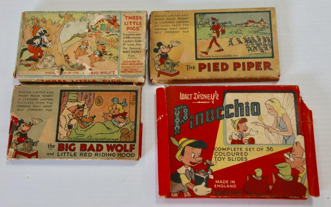 GROUP LOT OF WALT DISNEY SLIDES: (4) TOTAL PACKS - PINOCCHIO WITH (36) TOTAL SLIDES - PIED PIPER WITH (16) TOTAL SLIDES - THE BIG BAD WOLF AND RED RIDING HOOD (16) TOTAL SLIDES - THREE LITTLE PIGS WITH (24) SLIDES Size:PIN. 5 1/2" X 
