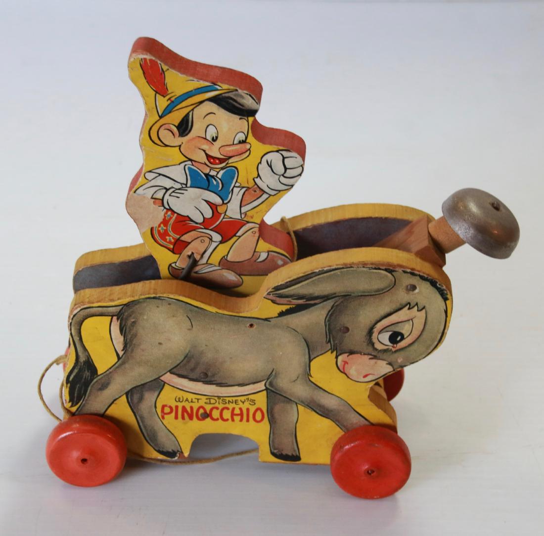 PINOCCHIO AND DONKEY PULL TOY: WOOD LITHOGRAPHED BY FISHER PRICE #494 - MARKED 1939 WALT DISNEY PRODUCTIONS Size:8" X 8 3/4"