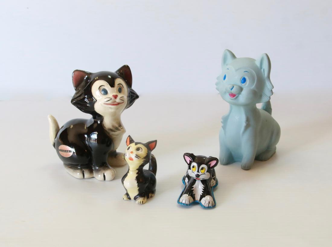 GROUP LOT OF FIGARO FIGURES: (4) INCLUDING SQUEEZE TOY - MARKED "STAR" - PORCELAIN CAT, BY; AMERICAN POTTERY CO. - SMALL HAND PAINTED FIGURINE MARKED GERMANY - TIN LINEMAR FRICTION TOY Size:1 1/2" TO 5" H