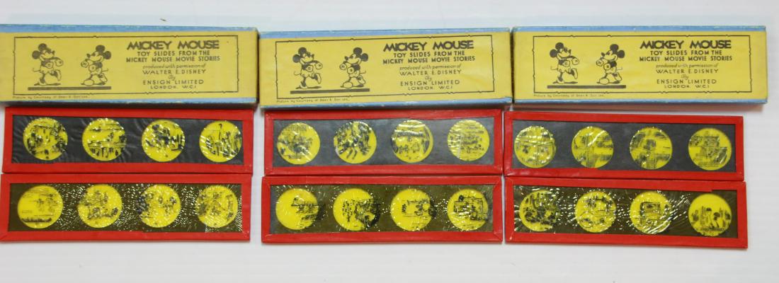 GROUP OF MICKEY MOUSE SLIDES: (3) BOXES WITH 2 SLIDES AND INSTRUCTIONS IN EACH - "THE CACTUS KID", "PIONEER DAYS", AND "MICKEY STEPS OUT" - TOY SLIDES FROM THE MICKEY MOUSE MOVIE STORIES SIZE:5 1/2" X 1 1/2"