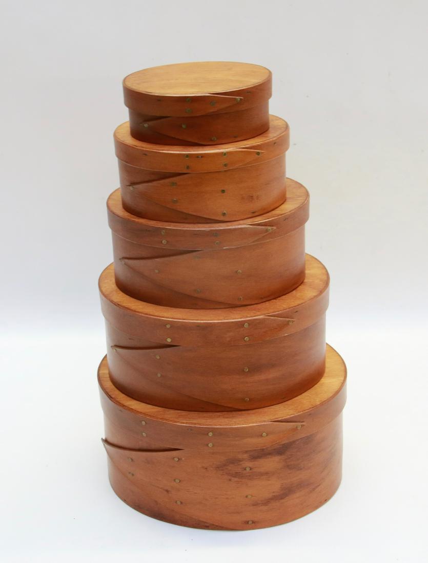 STACK OF WOODEN PANTRY BOXES: FIVE GRADUATED OVAL BOXES MADE BY FREYES MEASURE MILL