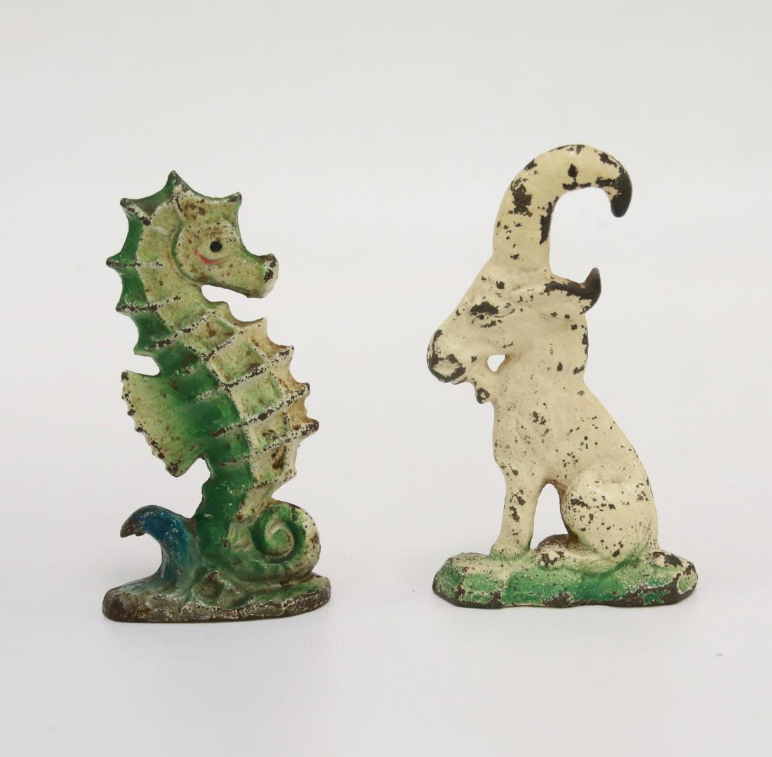 PAIR OF CAST IRON BOTTLE OPENERS: INCLUDES A BILLY GOAT AND SEAHORSE MRKD." JOHN WRIGHT, INC."