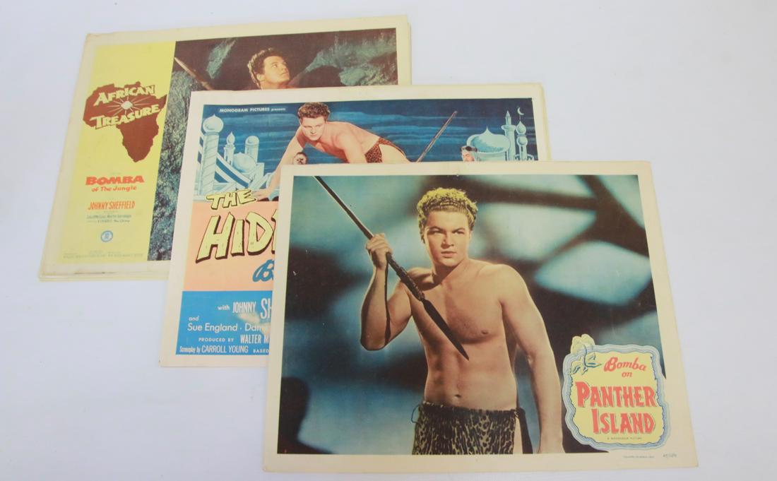 GROUP LOT OF JOHNNY "BOMBA" SHEFFIELD LOBBY CARDS: EIGHT "THE HIDDEN CITY", EIGHT "AFRICAN TREASURE", AND FIVE "BOMBA ON PANTHER ISLAND"