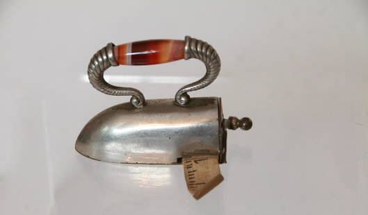 MINIATURE OXTONGUE IRON: OXTONGUE IRON TAPE MEASURE WITH GLASS HANDLE - DATED IN SCRIBE 1913 WITH NAMES Size: 2"