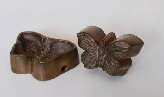 BRONZE EMBOSSING IRON: 2 PIECE EMBOSSING IRON IN THE FORM OF A BUTTERFLY - TOP HANDLE HAS INSCRIBED NAME "KISS" Size: 3"