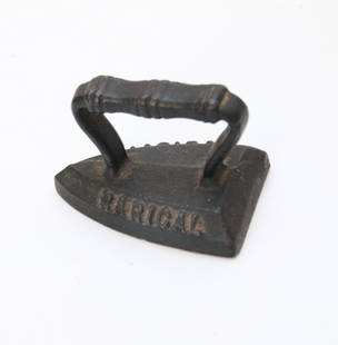 ADVERTISING IRON: SMALL SIZE SAD IRON - "RARICAL" EMBOSSED ON BOTH SIDES - ORIGINAL PAPER LABEL ON BOTTOM Size: 2 3/4"