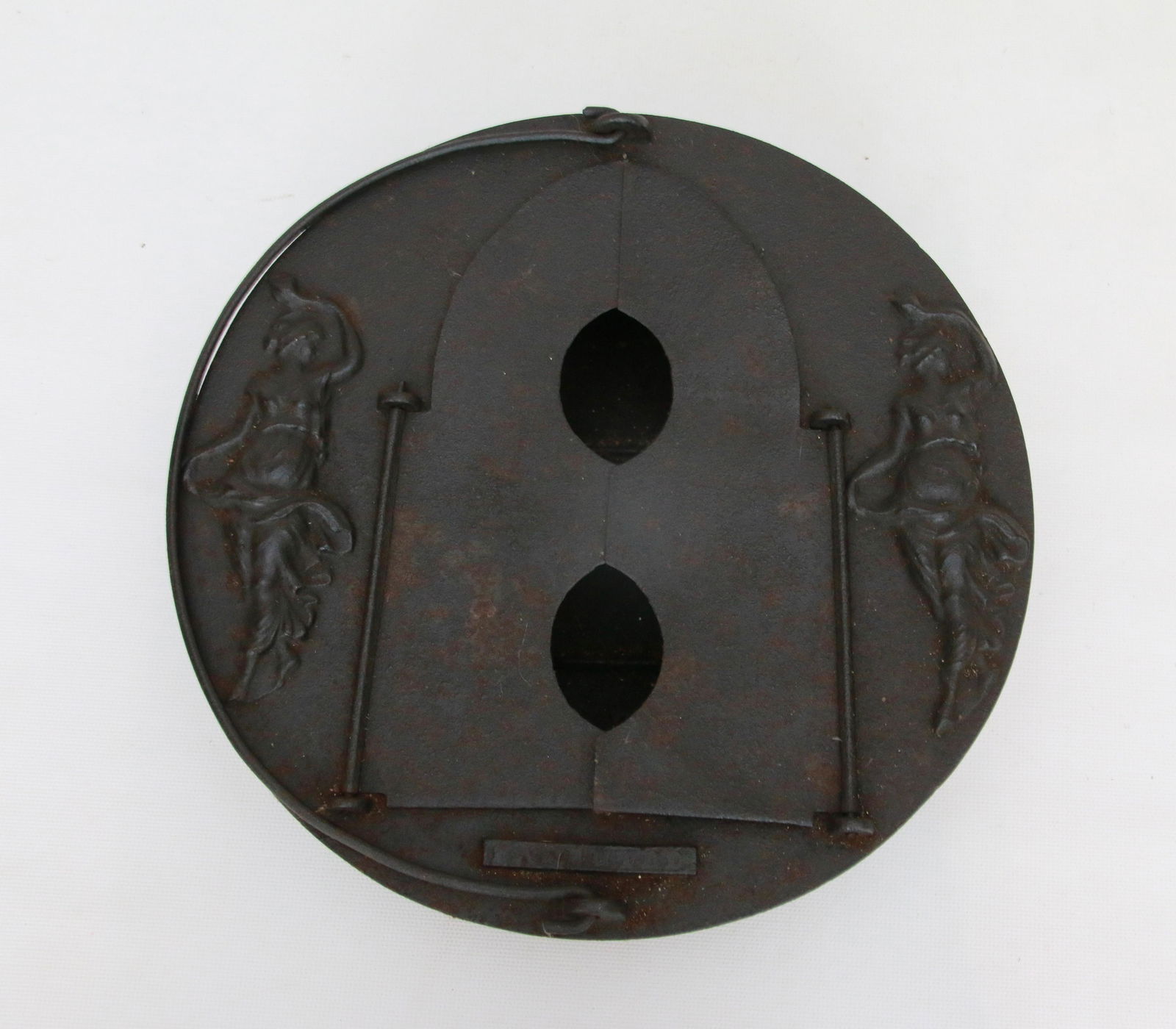 SINGLE SAD IRON HEATER: EMBOSSED SURFACE WITH DANCING LADIES - PATENT PENDING Size: 9 1/2" DIAMETER