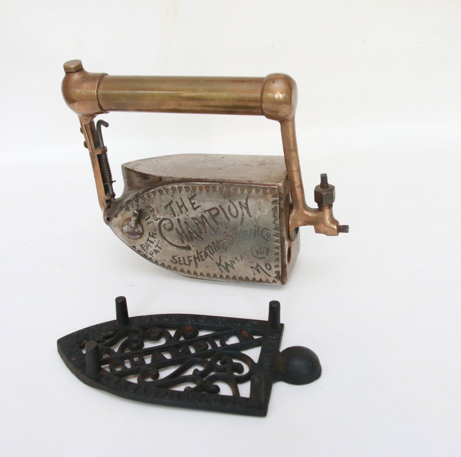 THE "CHAMPION" REVOLVING FUEL IRON: BRASS TANK HANDLE - ORIGINAL COMPANION TRIVET - ONE OF ONLY (2) KNOWN TO BE IN EXISTENCE Size: 6" SIDES