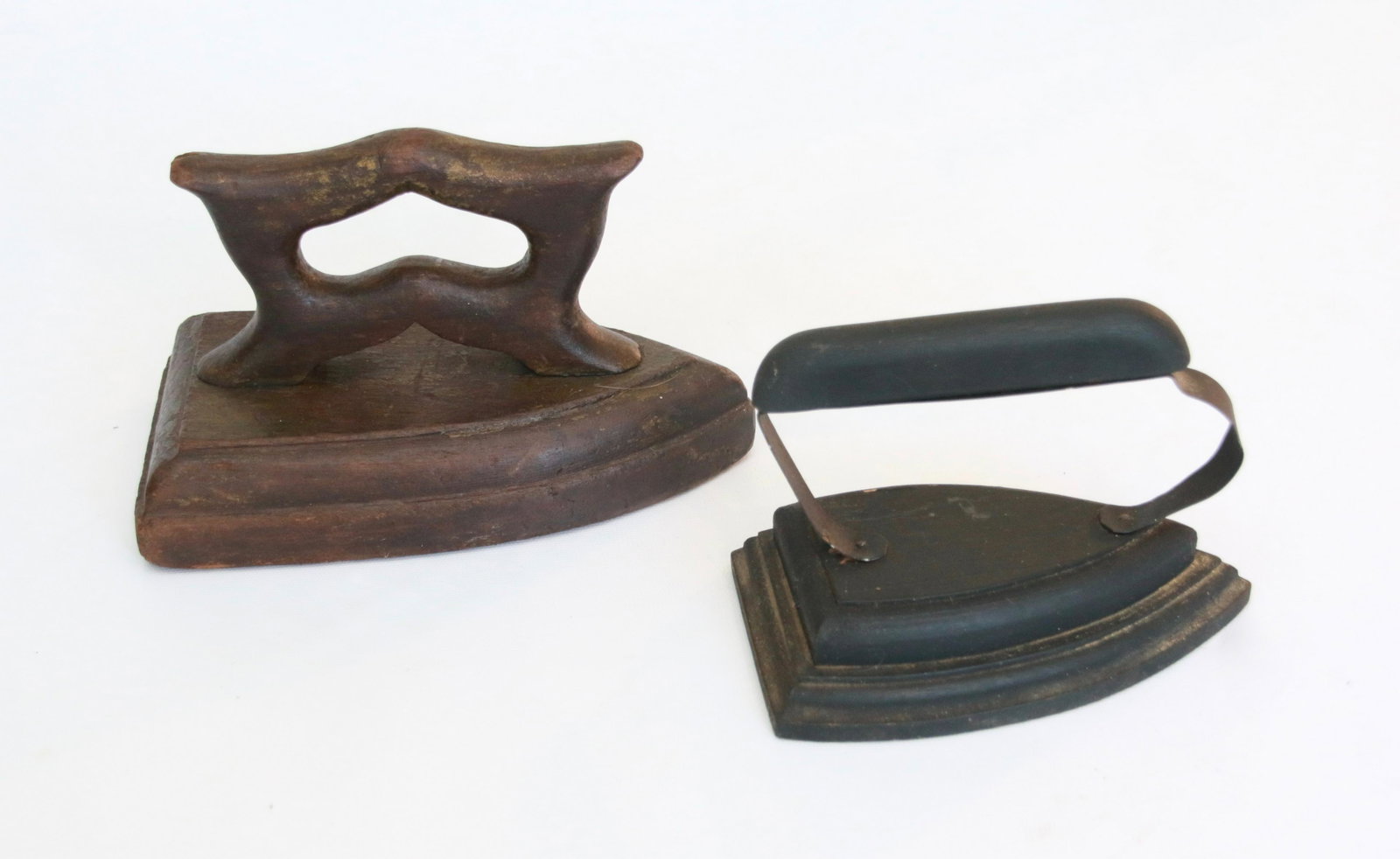 PR. OF HANDMADE WOODEN IRONS: TRACES OF ORIGINAL PAINT Size: 5 1/2" AND 7 1/4"
