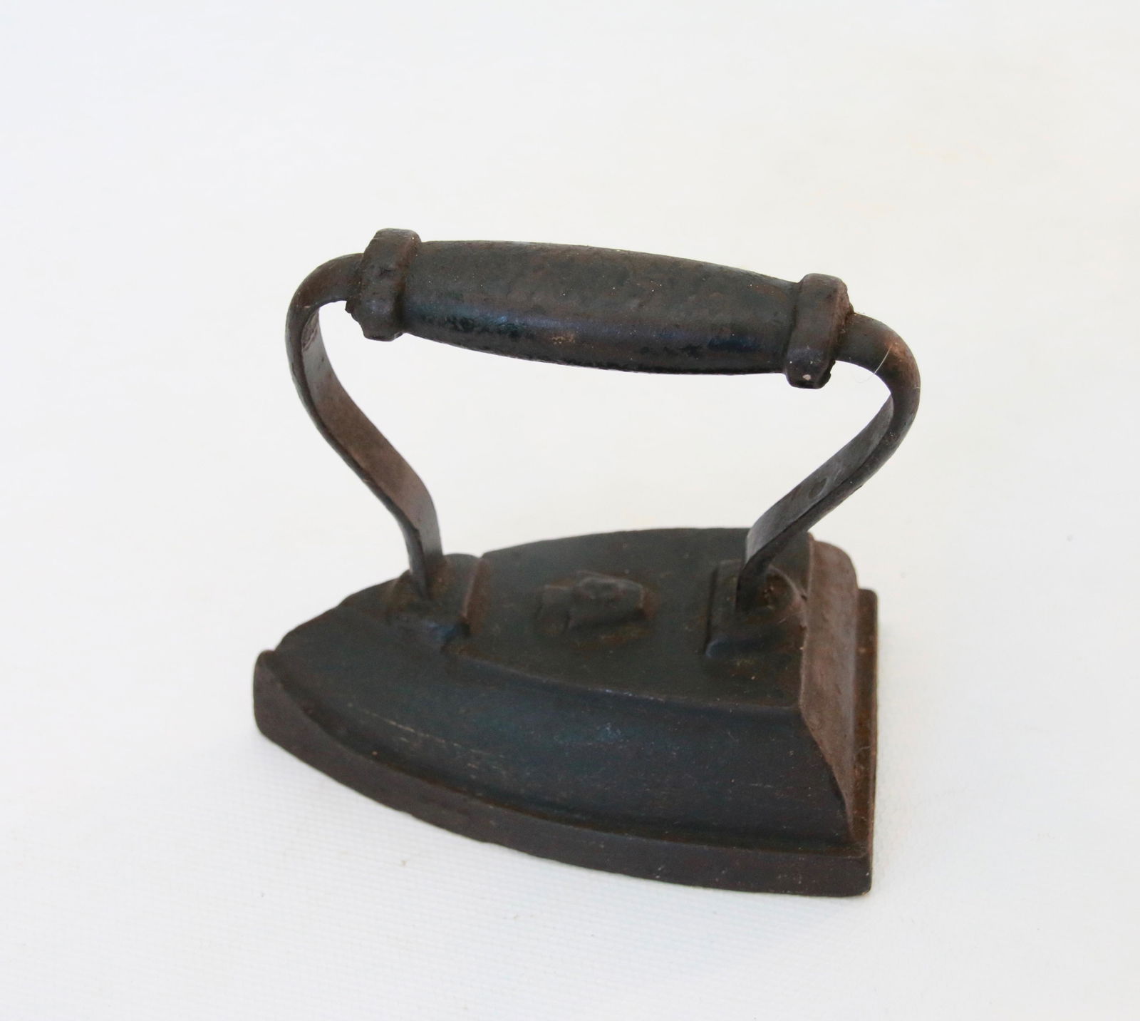 EARLY SAD IRON: EMBOSSED "KEYSTONE 3" Size: 3 1/2"