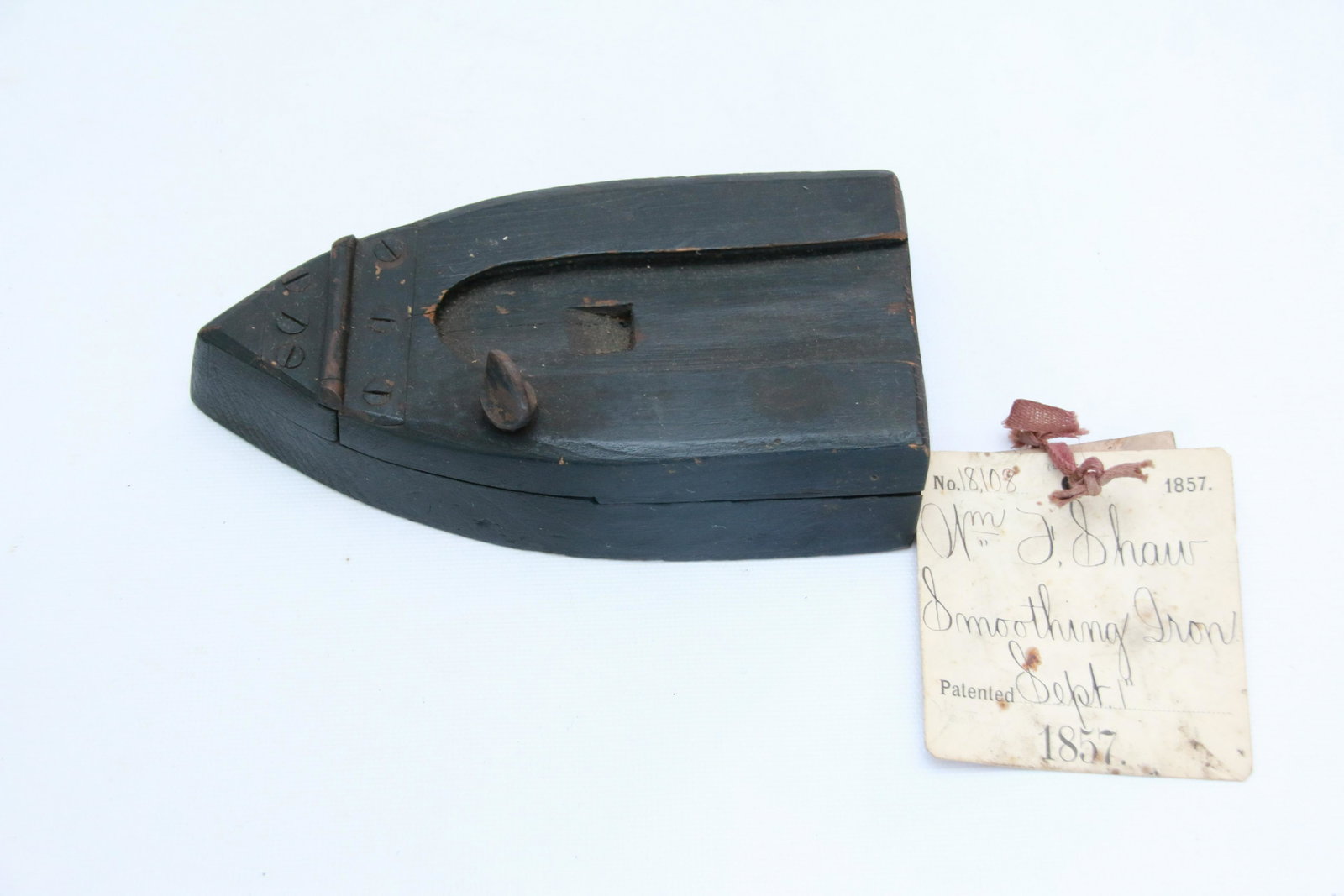 PATENT MODEL SMOOTHING IRON: WILLIAM J. SHAW - 1857 - WITH TAG - WOODEN Size: 6 3/4"