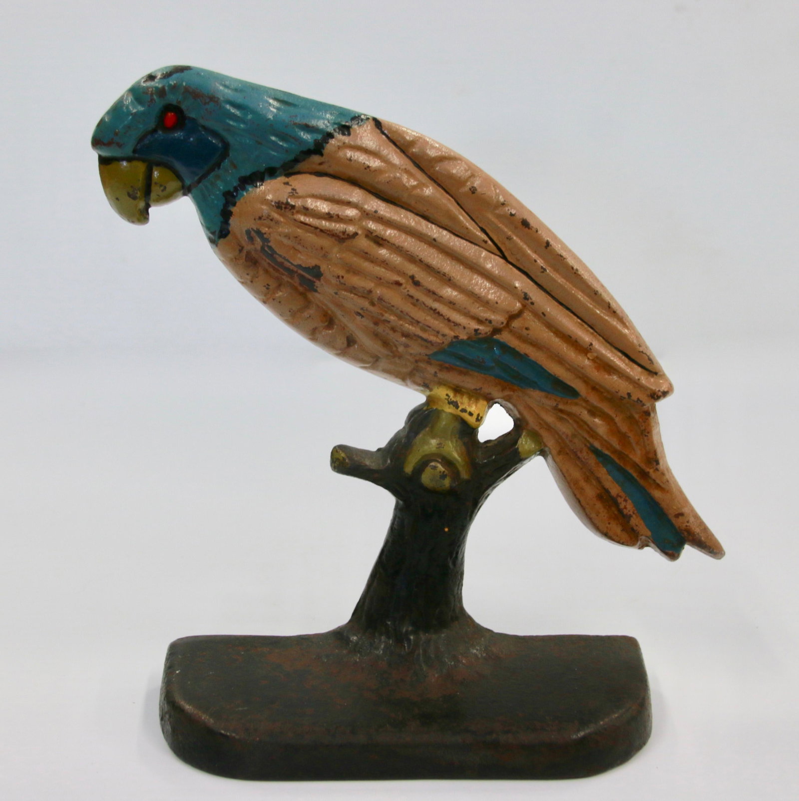 VINTAGE CAST IRON PARROT DOOR STOP: 20TH CENTURY PARROT DOORSTOP WITH ORIGINAL PAINT Size: 7 3/4" H
