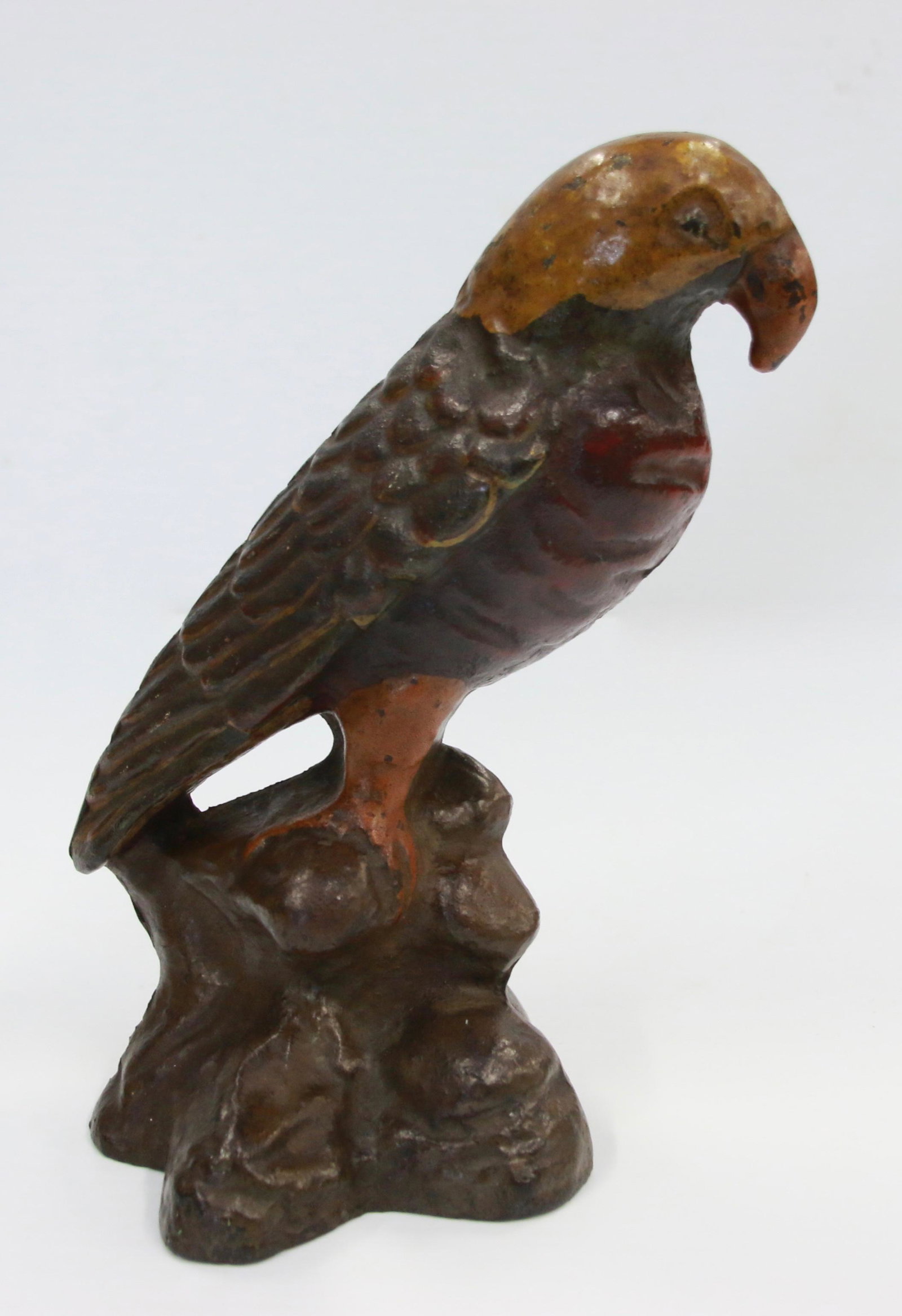 VINTAGE CAST IRON PARROT DOOR STOP: CIRCA 1920 - PARROT ON A BRANCH IN ORIGINAL PAINT Size: 8" H