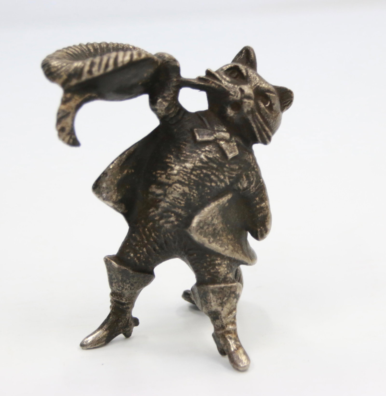 19TH CENTURY CANDLE HOLDER: PUSS AND BOOTS RARE CANDLE HOLDER - CAST IRON Size: 3 3/4"