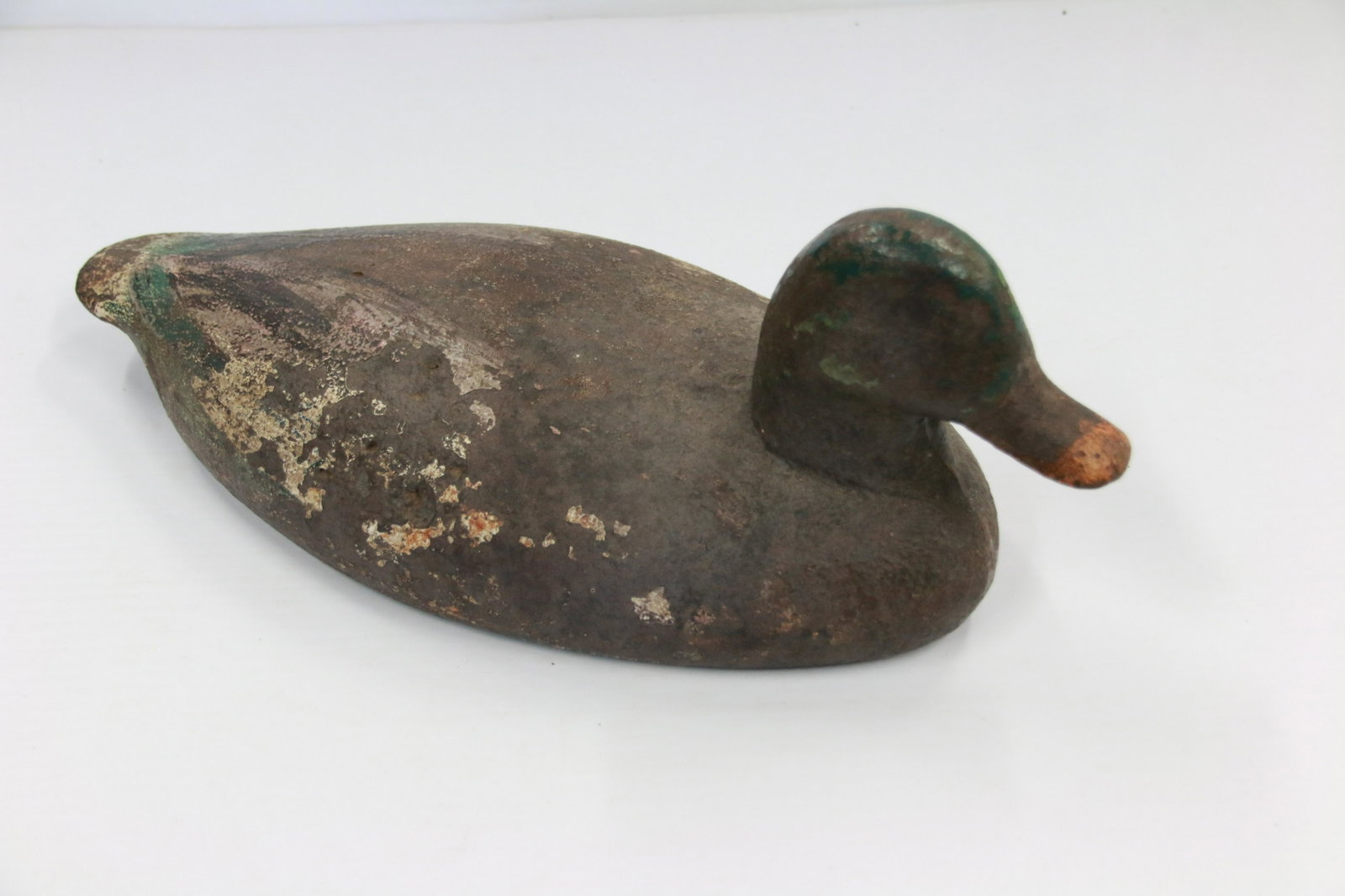 VINTAGE CAST IRON SINK BOX DECOY: 19TH CENTURY DUCK SINK BOX DECOY - IN ORIGINAL PAINT - FOUND IN MAINE Size: 14" L