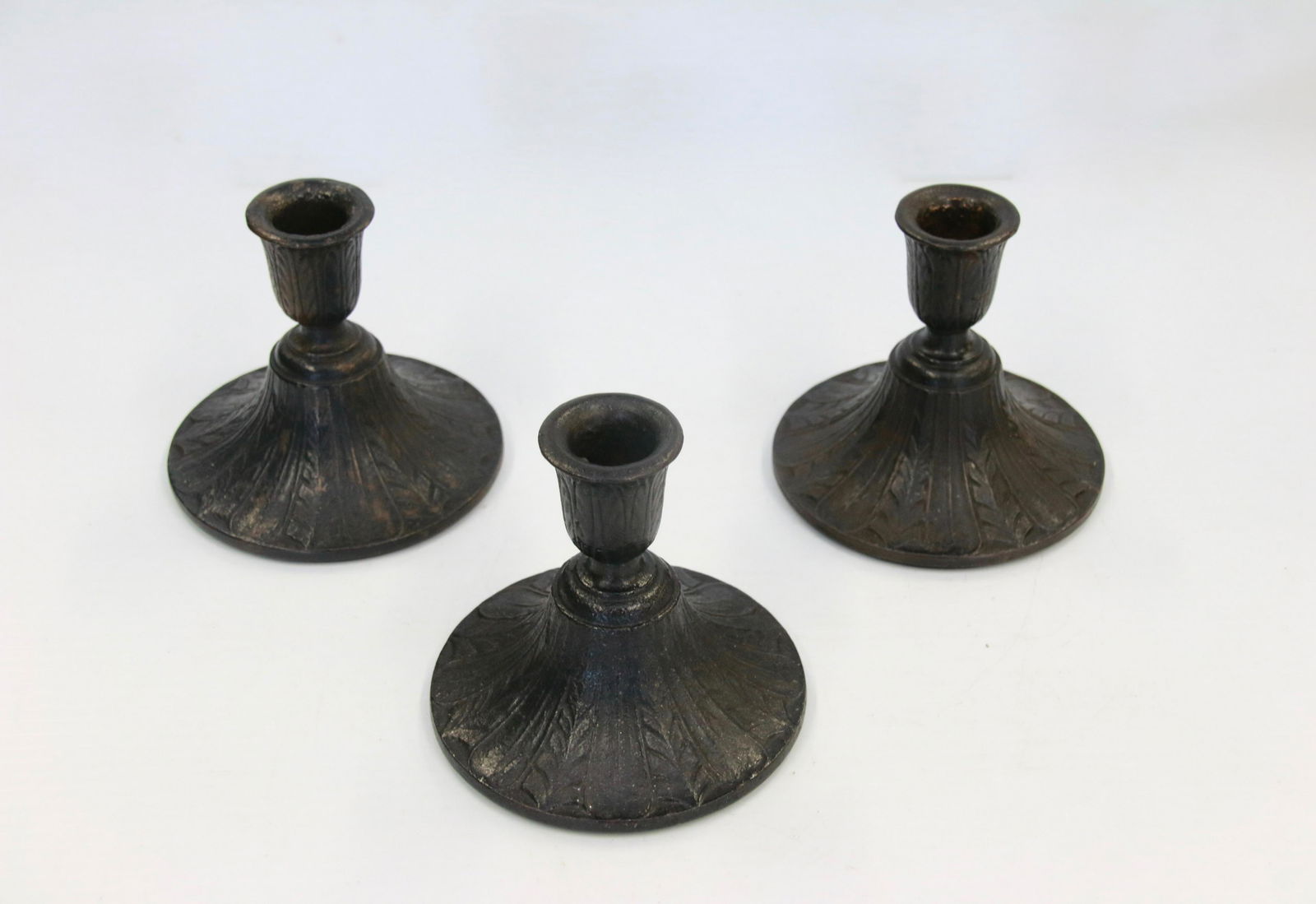 CAST IRON CANDLESTICK LOT: (3) MATCHING CAST IRON ART DECO CANDLE HOLDERS - LEAF DESIGN - FOUND IN PENNSYLVANIA Size: 4" H