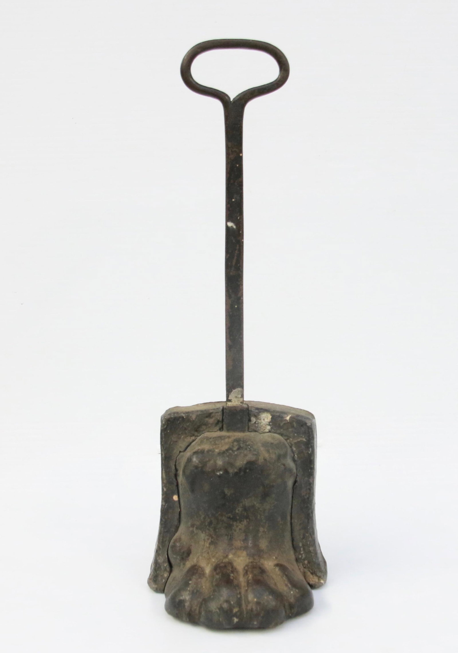 CAST IRON AND LEAD DOOR STOP: IN THE FORM OF A LION'S PAW - 19TH CENTURY Size: 14 1/2" H