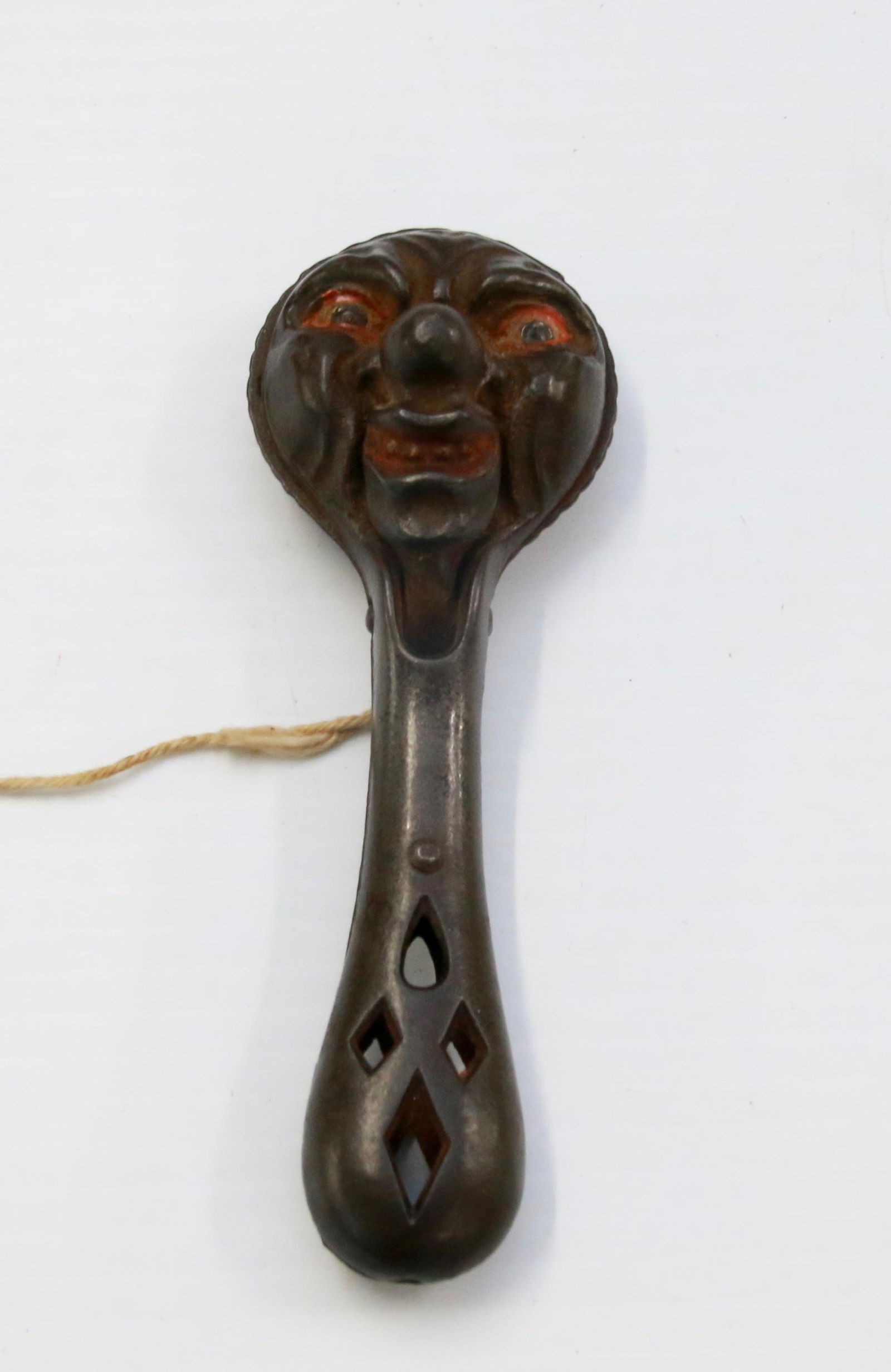 19TH CENTURY CAP BOMB: IN THE FORM OF A MOON FACE - HAND PAINTED, BY IVES Size: 5 1/4"