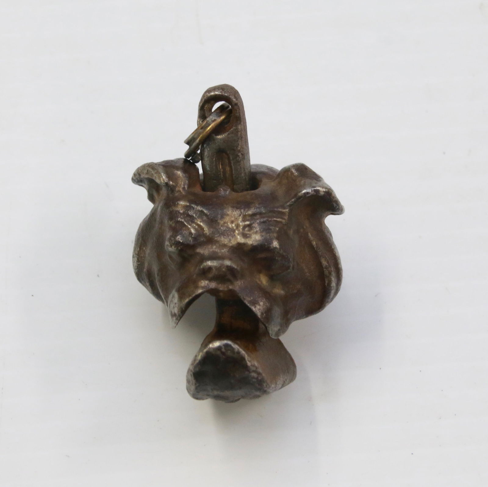 CAST IRON CAP BOMB: IN THE FORM OF A BULLDOG - UNMARKED Size: 2" X 1 1/2"