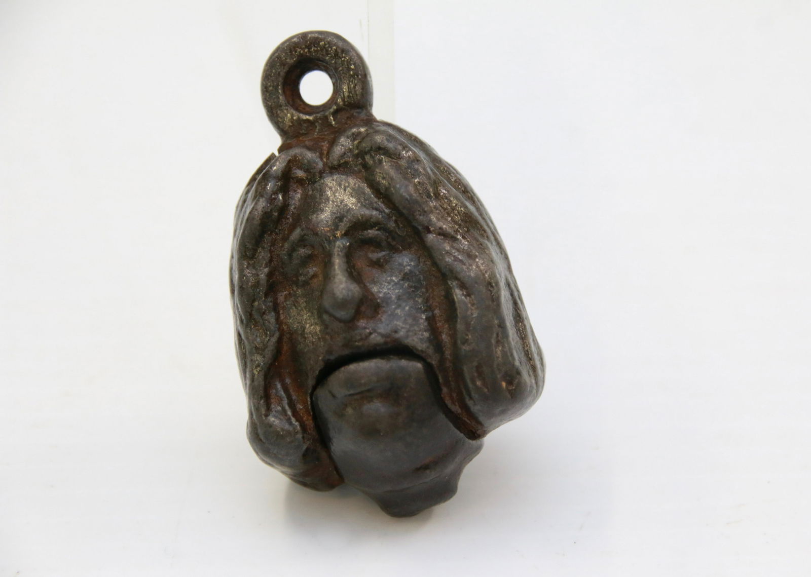 CAST IRON CAP BOMB: DOUBLE SIDED FACE DESIGN - UNMARKED Size: 2" X 1 1/4"