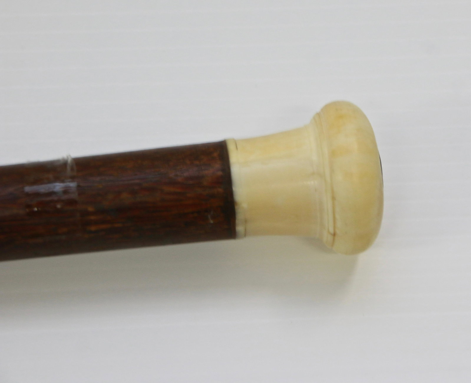 ANTIQUE BONE TOP CANE / WALKING STICK: MID 19TH CENTURY WITH BONE TOP AND WOOD INSERT - COCONUT WOOD PALM SHAFT AND BONE FERRULE Size: 33"