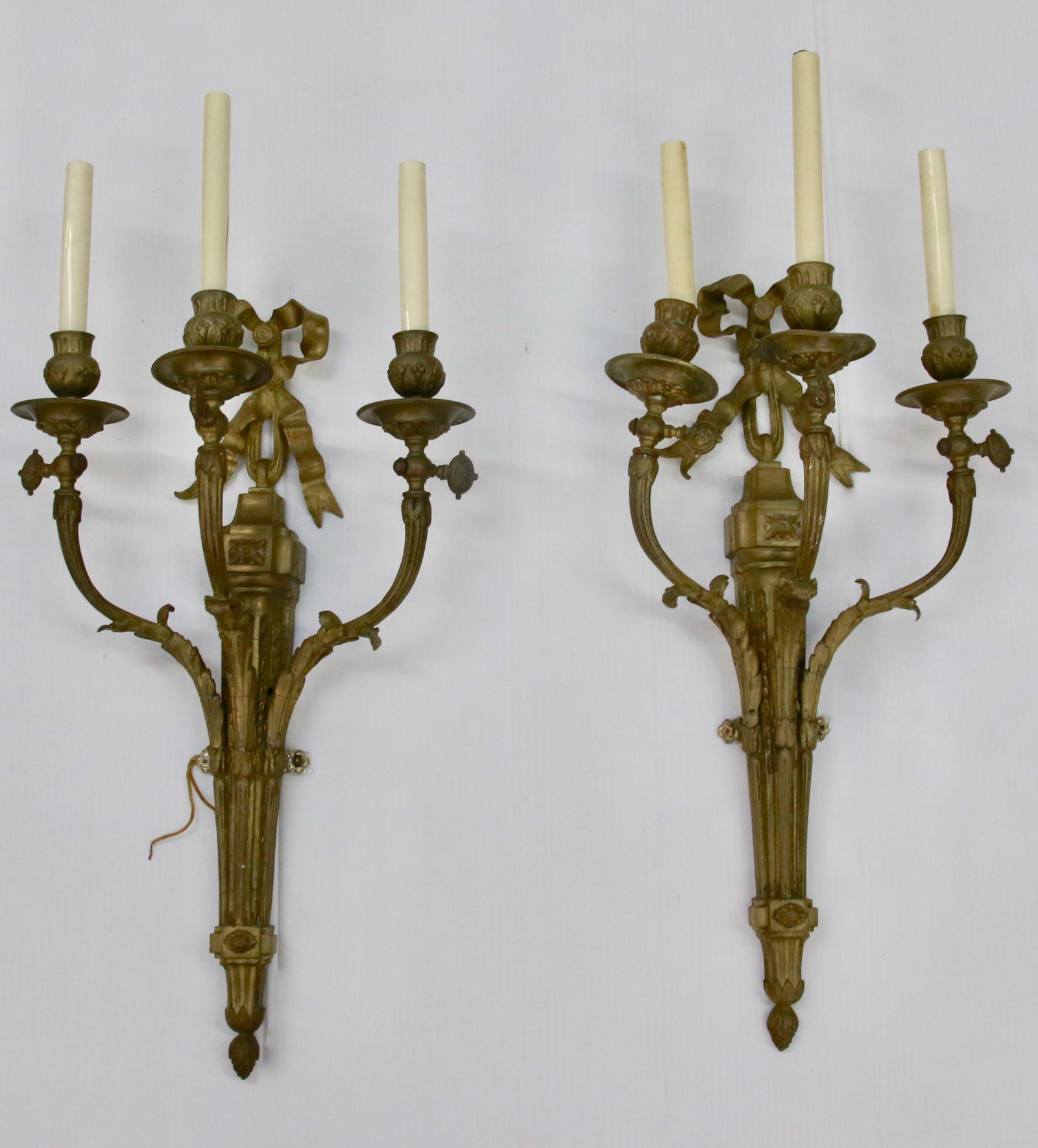 PR. OF HOLLYWOOD REGENCY WALL SCONCES: CAST BRASS WITH BOW MOTIF - ELECTRIFIED Size: 24" X 14 1/2" X 8"