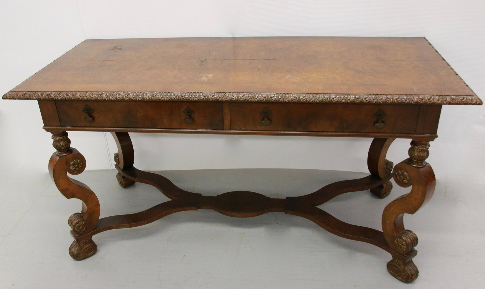 BURLED ELM LIBRARY DESK: 2 DRAWER DESK WITH STRETCHER BASE - CARVED LEGS AND TOP EDGE 60" X 27" X 30"