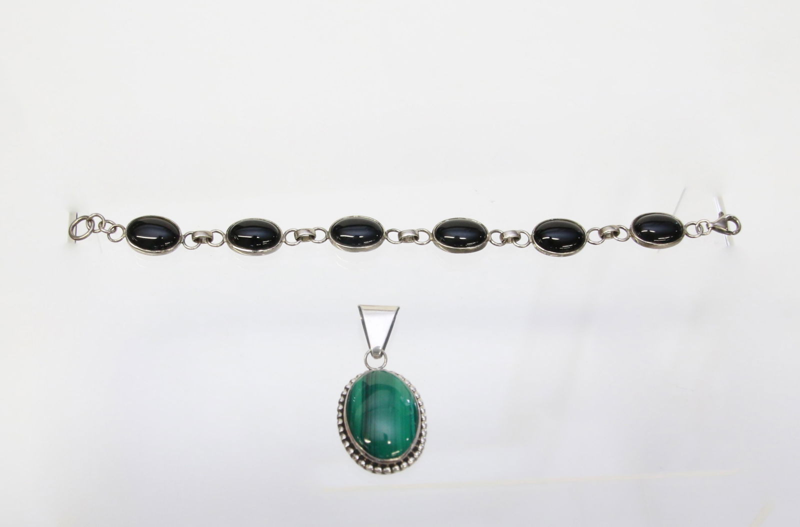 STERLING SILVER JEWELRY LOT: PENDANT WITH LARGE MALACHITE - CABOCHON - BRACELET WITH ONYX CABOCHON .85 OZT - 1.9" X .1" - BRACELET 7.25"