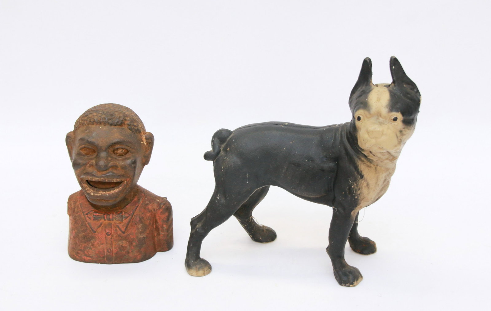 PAIR OF CAST IRON FIGURES: CAST IRON DOG DOORSTOP AND JOLLY ***GER MECHANICAL BANK DOG IS 9" X 10" AND BANK IS 6 1/2" H