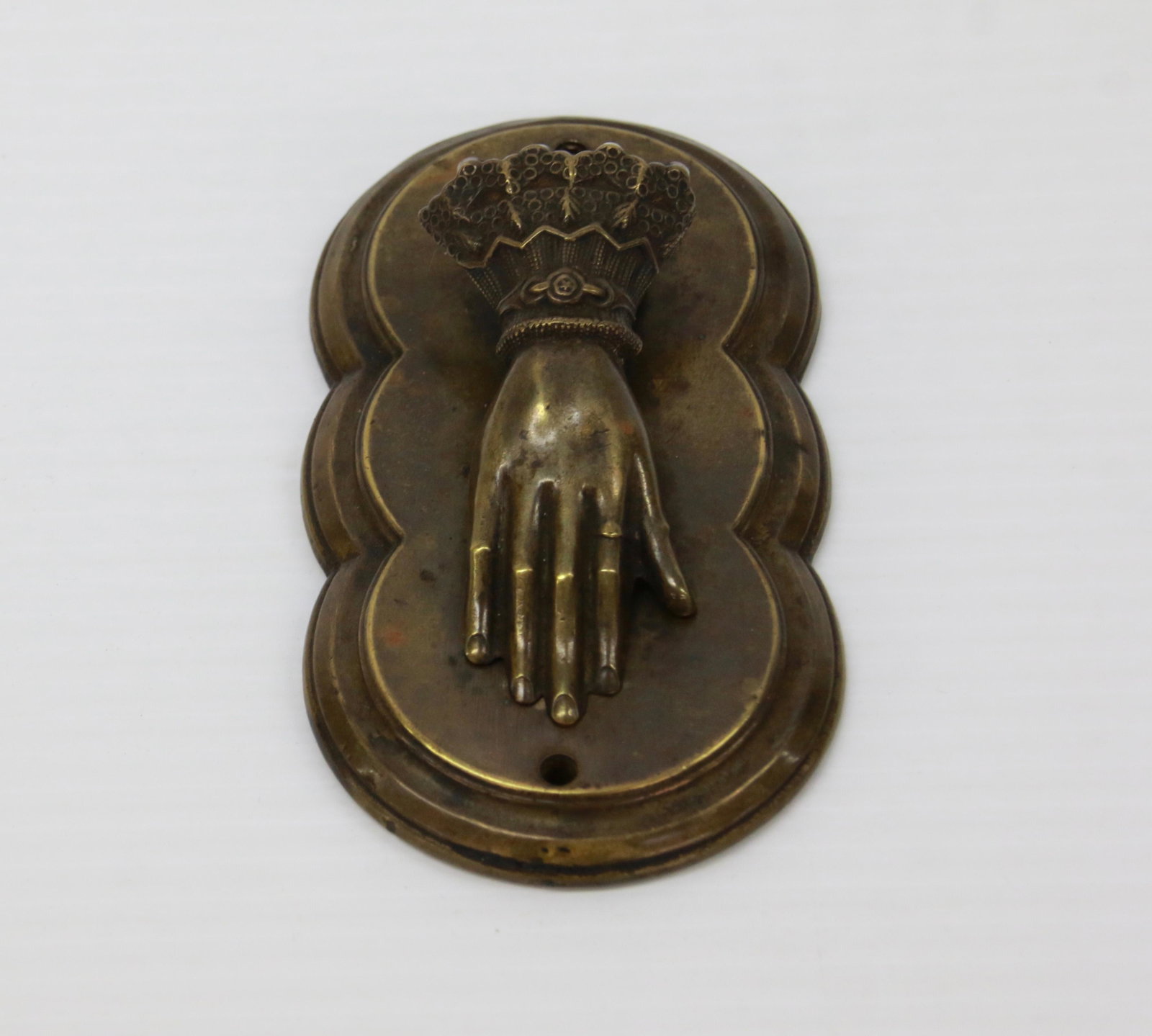 BRASS BILL CLIP IN THE FORM OF A HAND: BRASS HAND WITH FANCY RUFFLE 5" X 2 1/2"