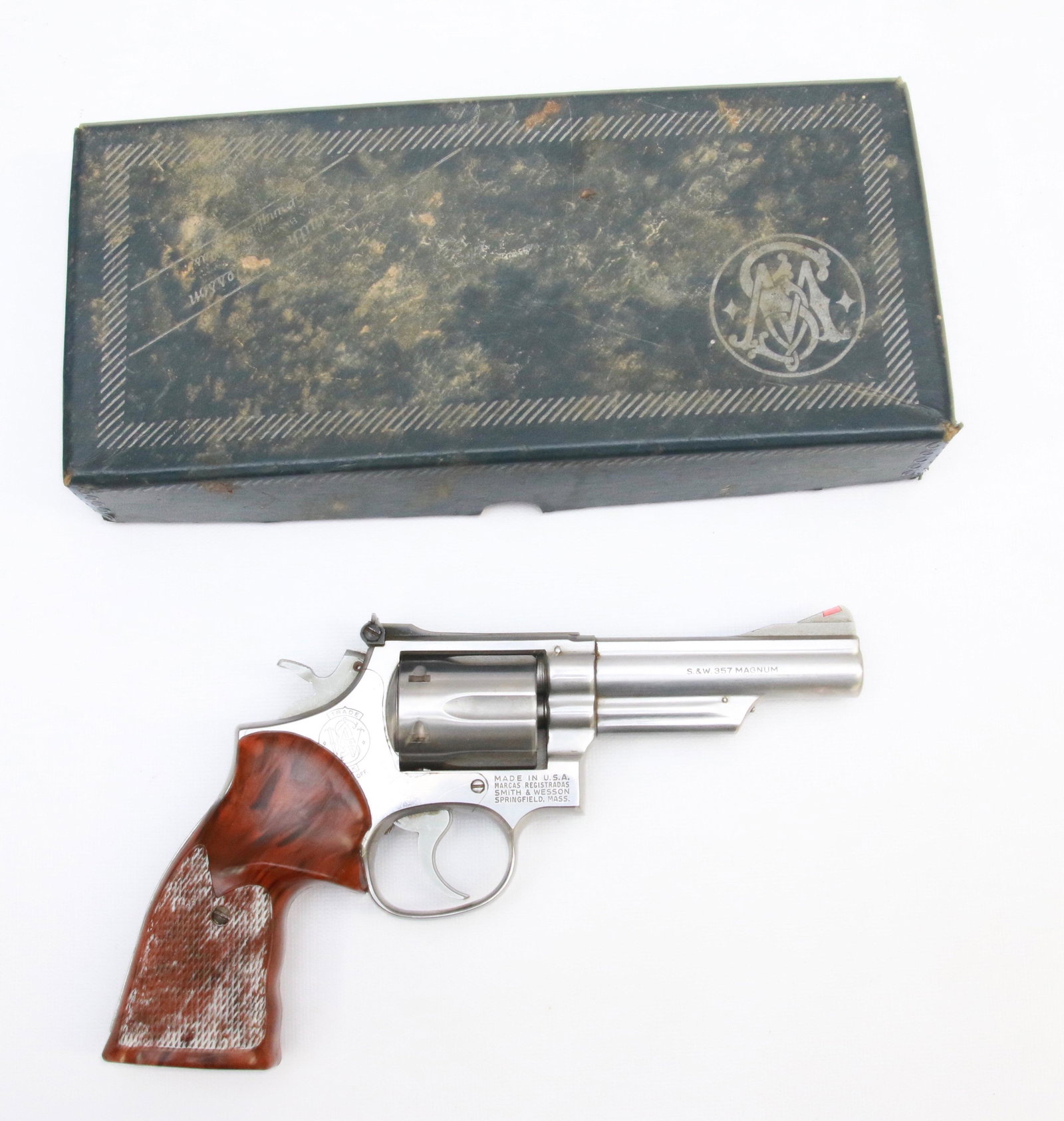 SMITH AND WESSON MODEL 66: .357 STAINLESS STEEL - SERIAL# 9K84910 - 4" BARREL - WITH BOX - MARKS ON RIGHT SIDE BY TRIGGER Size: 4" BARREL Important Info.: BACKGROUND CHECK OR FFL REQUIRED