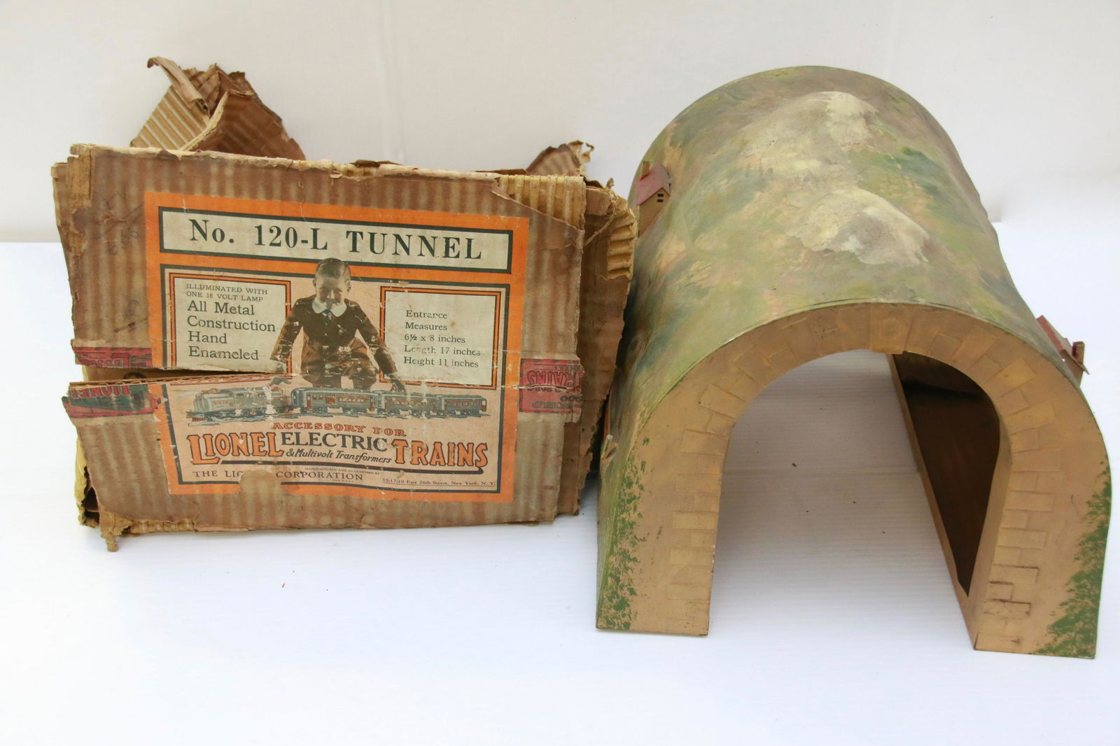 LIONEL TRAIN TUNNEL: NO. 120-L TUNNEL. LIT INTERIOR. REMNANTS OF ORIGINAL BOX. Size: 17"