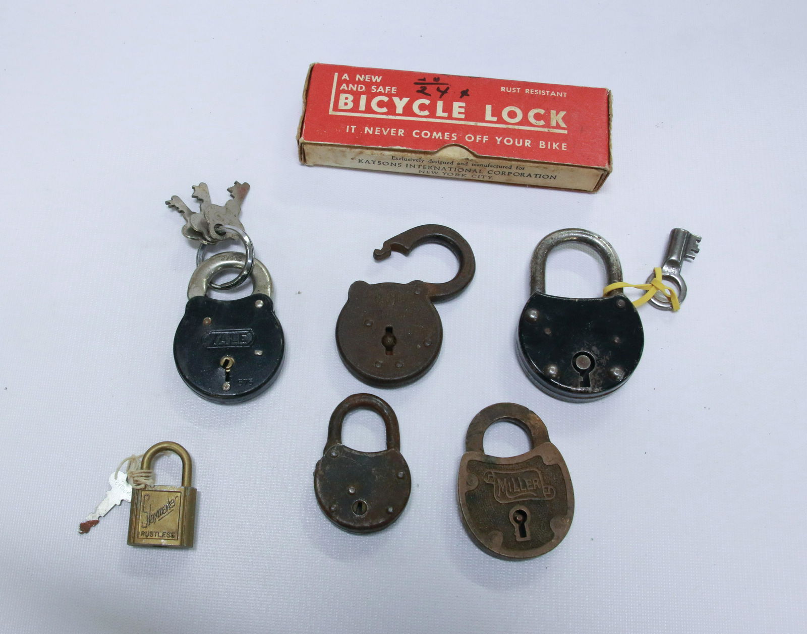 GROUP LOT OF VINTAGE LOCKS: SEVEN INCLUDING: YALE, MILLER, SLAYMAKER, BICYCLE LOCK AND MORE Size: 2" TO 3 1/2" HEIGHT