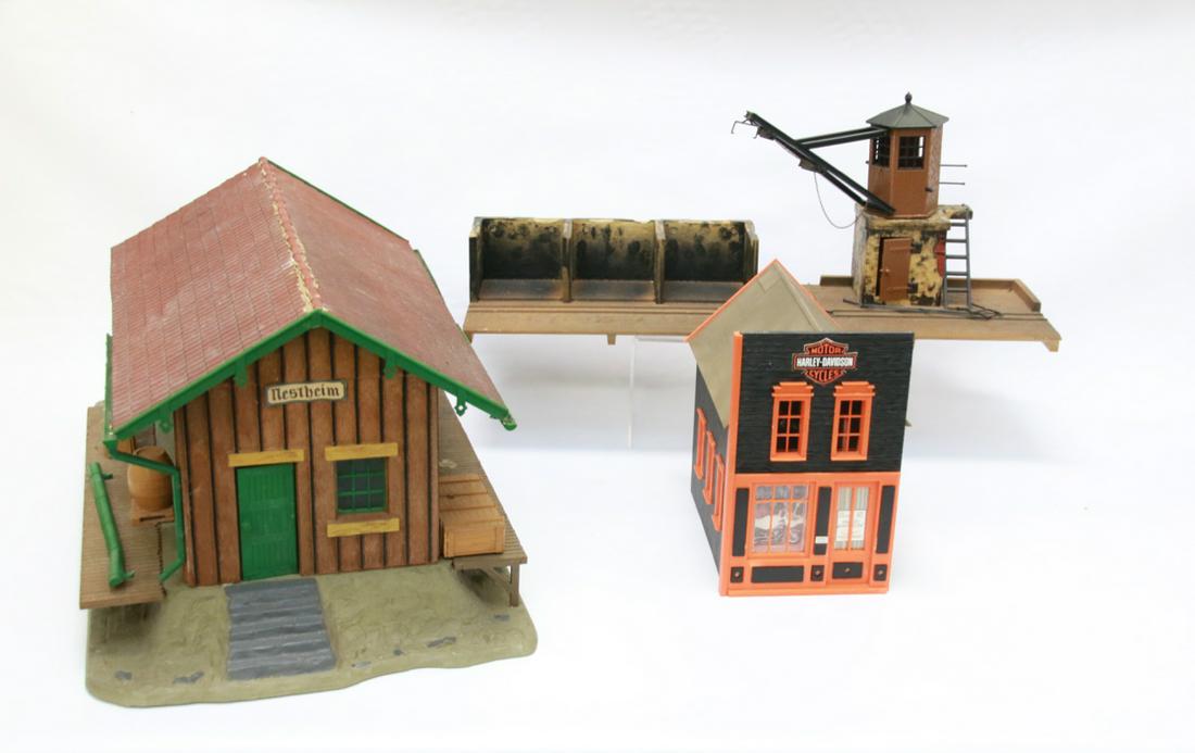 GROUP LOT OF LGB TRAIN STATION BUILDINGS: THREE INCLUDING: HARLEY-DAVIDSON STORE, CRANE WITH BINS AND NESTHEIM GOODS DEPOT Size: LARGEST IS 22" X 12 1/2" X 10 1/2"