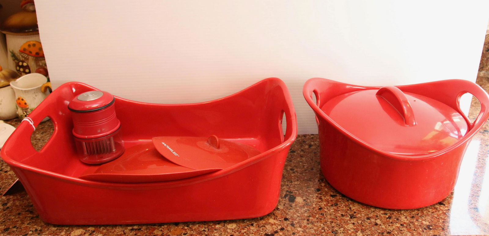 LOT OF RACHEL RAY COOKWARE: COVERED CASSEROLE, RUBBER LIDS, AND DEEP BASKET TYPE CARRIER - AND CHOPPER