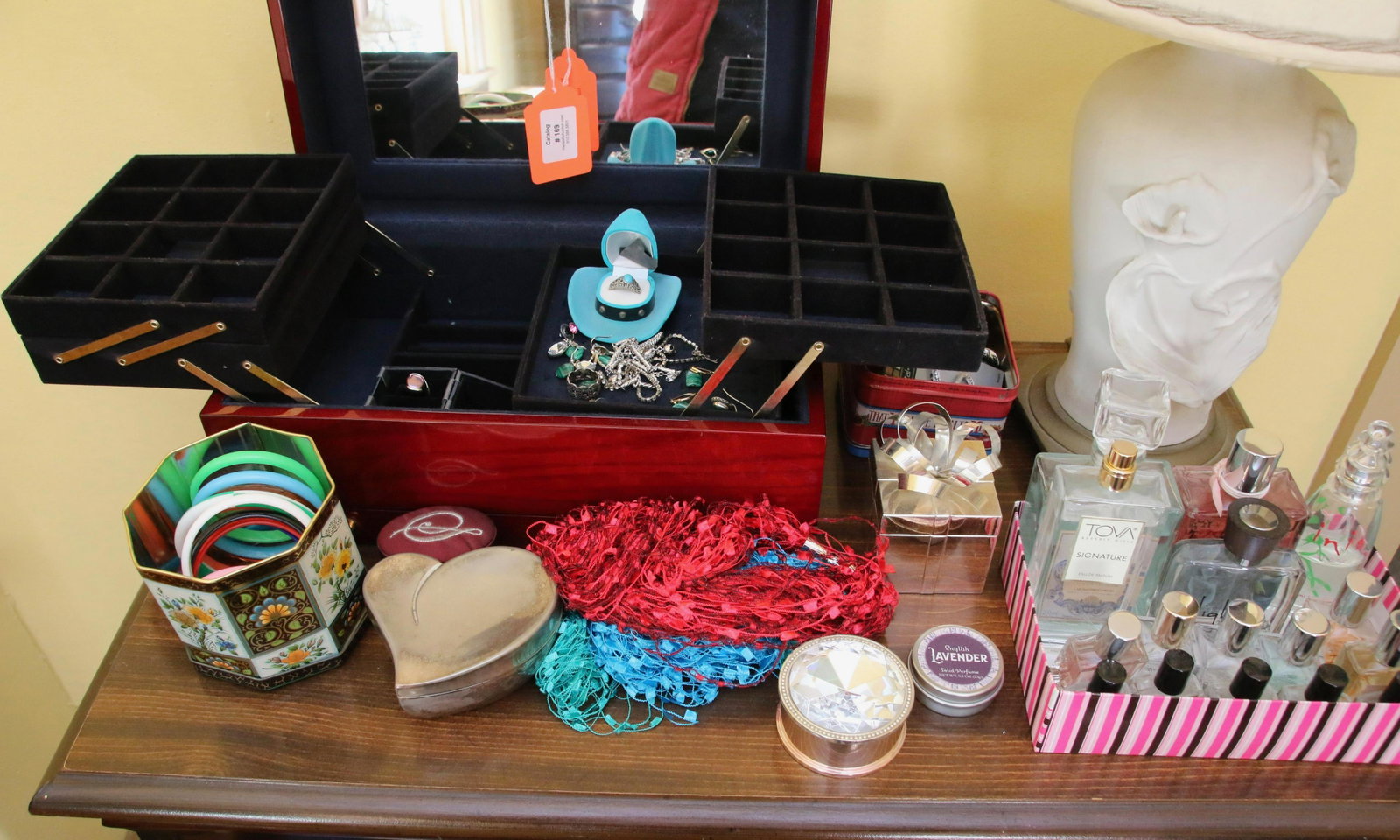 JEWELRY BOX AND CONTENTS: LARGE LOT OF JEWELRY, JEWELRY BOX, PERFUME, AND DRESSER BOXES