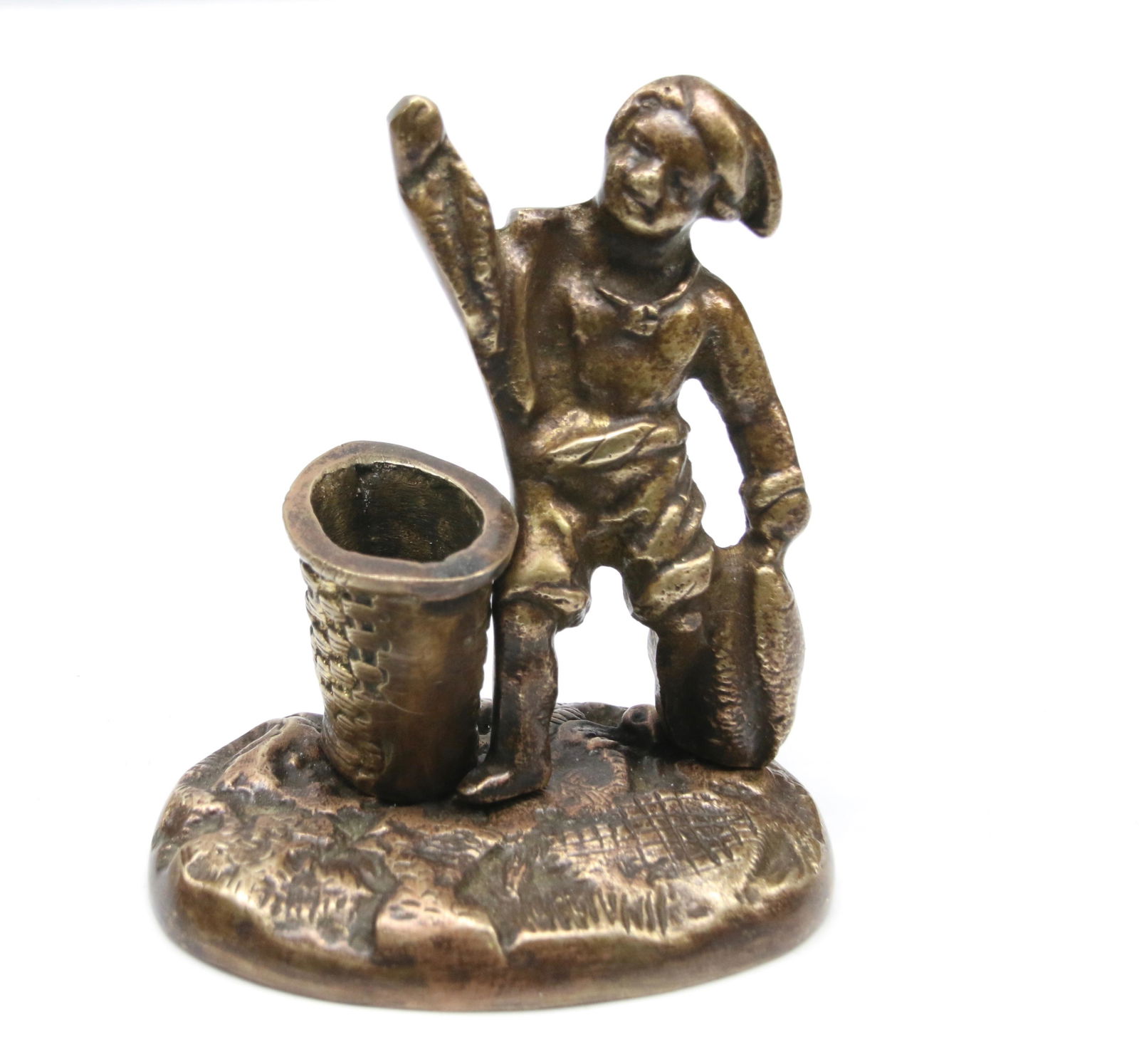 19TH CENTURY MATCH HOLDER: CAST IRON MATCH HOLDER - DEPICTING FISHERMAN WITH NET, FISH, AND BASKET - BRONZE COLORING - BASKET AND FIGURE SWIVEL Dimensions: 3 1/2" X 3 1/2"