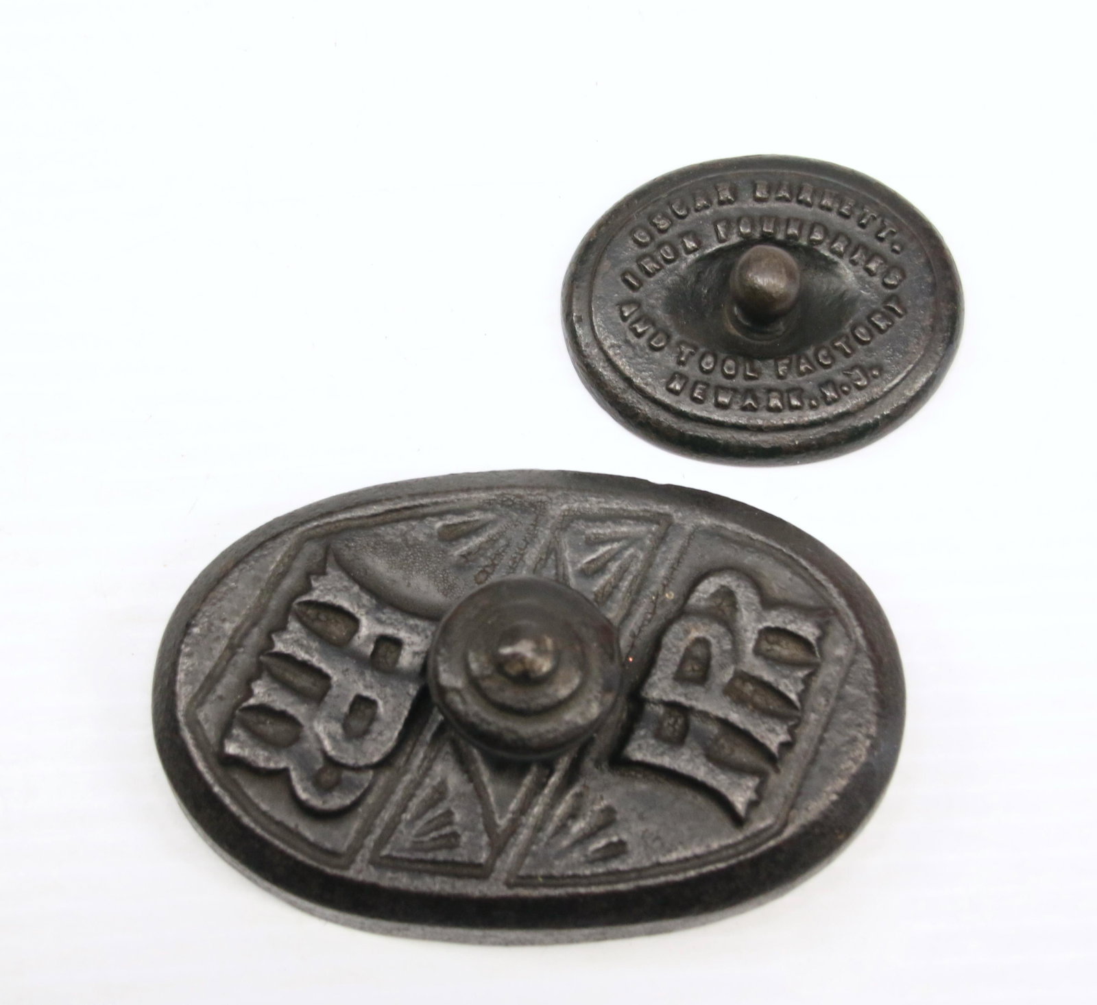 PR. OF 19TH CENTURY PAPERWEIGHTS: NEW JERSEY ADVERTISING PAPERWEIGHT; OSCAR BARKETT. IRON FOUNDRIES AND TOOL FACTORY NEWARK, NEW JERSEY - AND OVAL PAPERWEIGHT WITH EMBOSSED FPR ON TOP Dimensions: 5" AND 2 3/4"