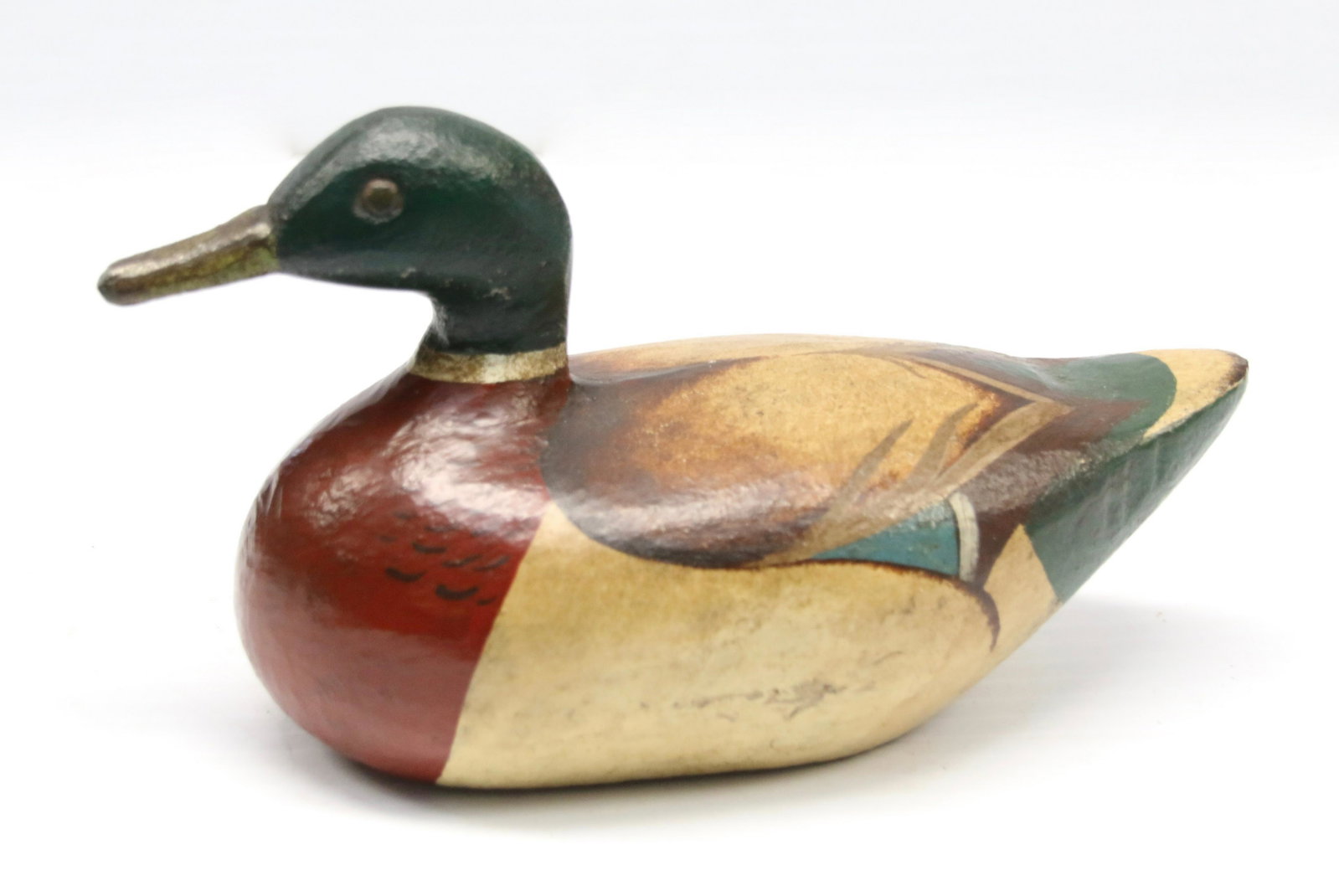 19TH CENTURY CAST IRON DUCK DOORSTOP: EARLY MALLARD DOORSTOP - POLLY CHROME PAINT - NEW YORK Dimensions: 7" L X 3 1/2" H