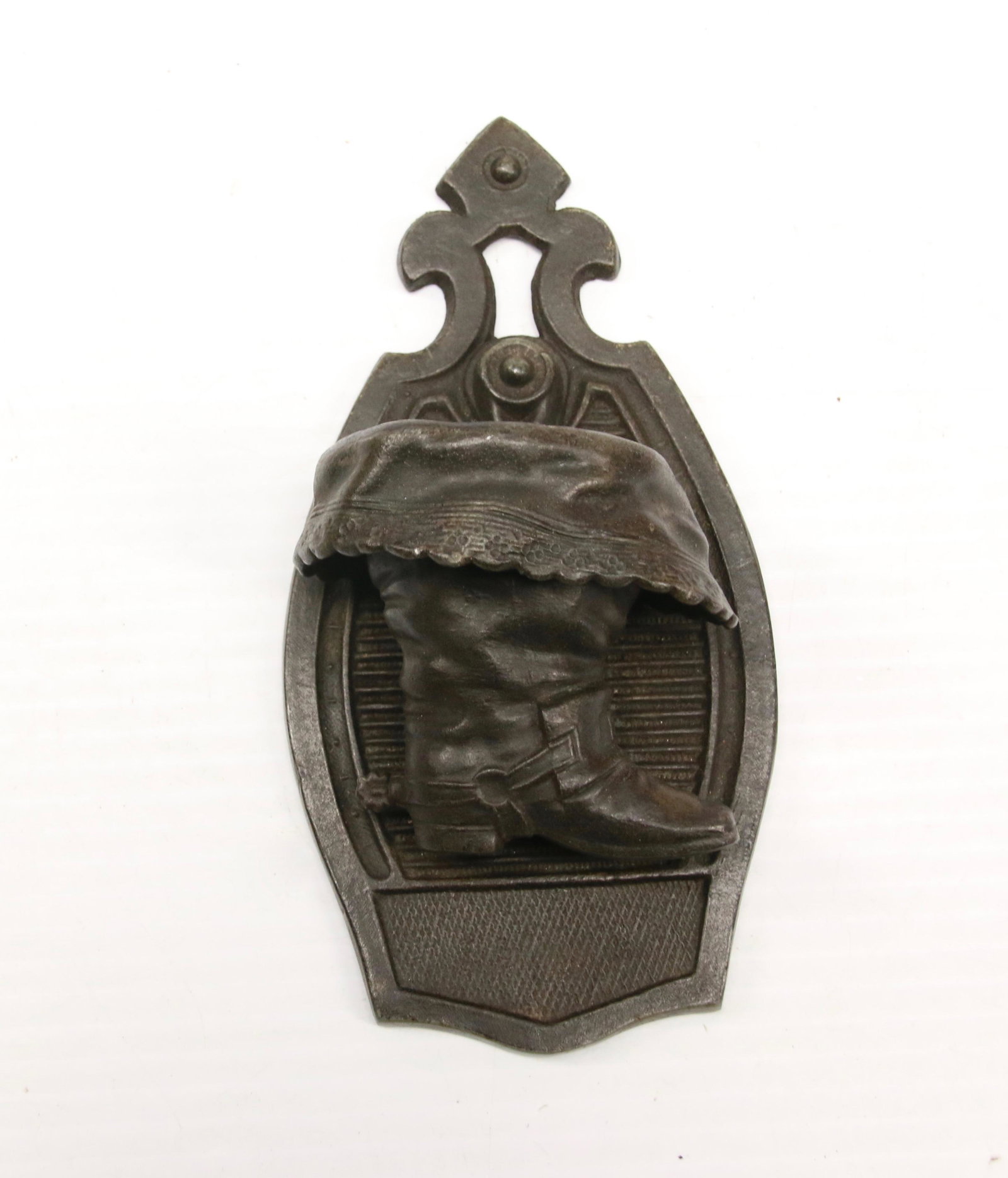 19TH CENTURY MATCH HOLDER: WHITE METAL MATCH HOLDER IN THE FORM OF A BOOT WITH SPUR Dimensions: 6 1/2"