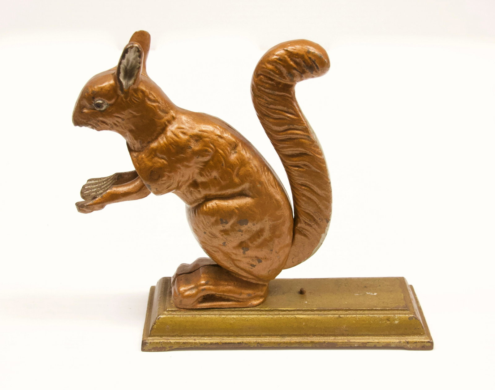CAST IRON SQUIRREL NUTCRACKER: MARKED "D.R.G.M." #383488 ON BOTTOM Dimensions: 6 1/2" X 6"