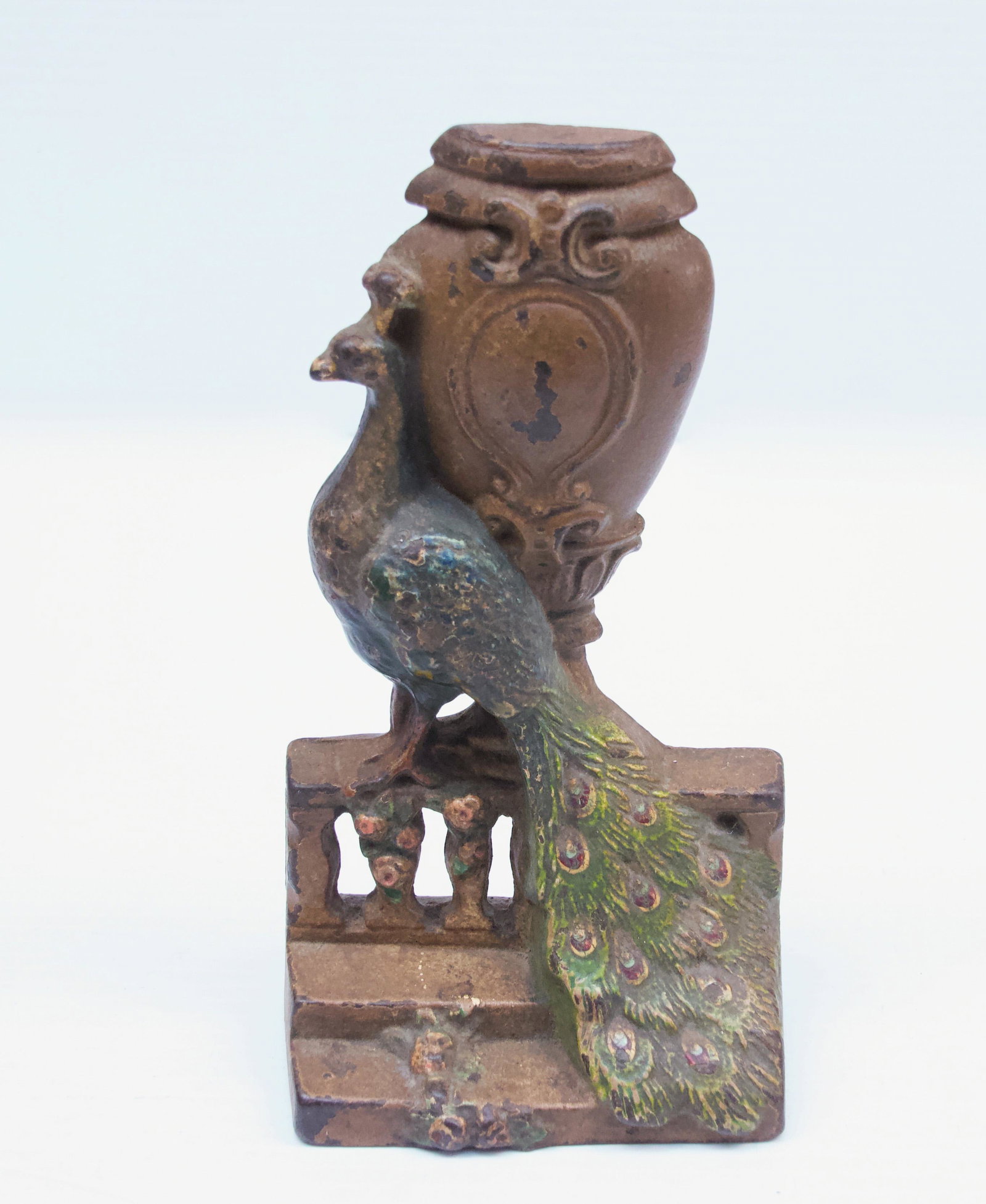 ANTIQUE HUBLEY DOOR STOP: 1920'S HUBLEY PEACOCK ON THE FENCE WITH ROSES AND URN DESIGN - ORIGINAL PAINT - #208 Dimensions: 7 1/2" H
