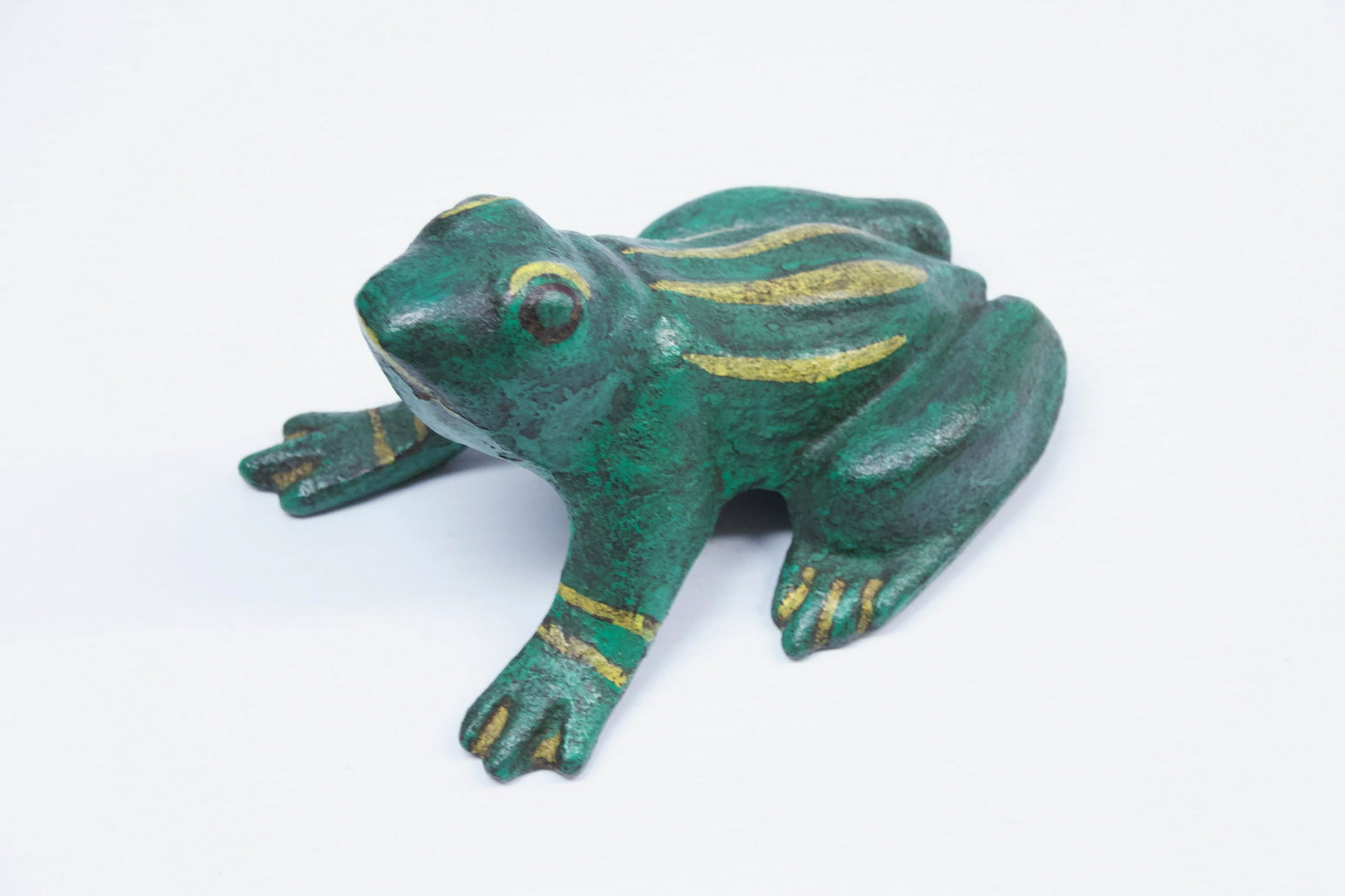 19TH CENTURY PENNSYLVANIA FROG DOORSTOP: ORIGINAL GREEN AND YELLOW PAINT - RARE FORM Dimensions: 3 1/2" H X 7" L