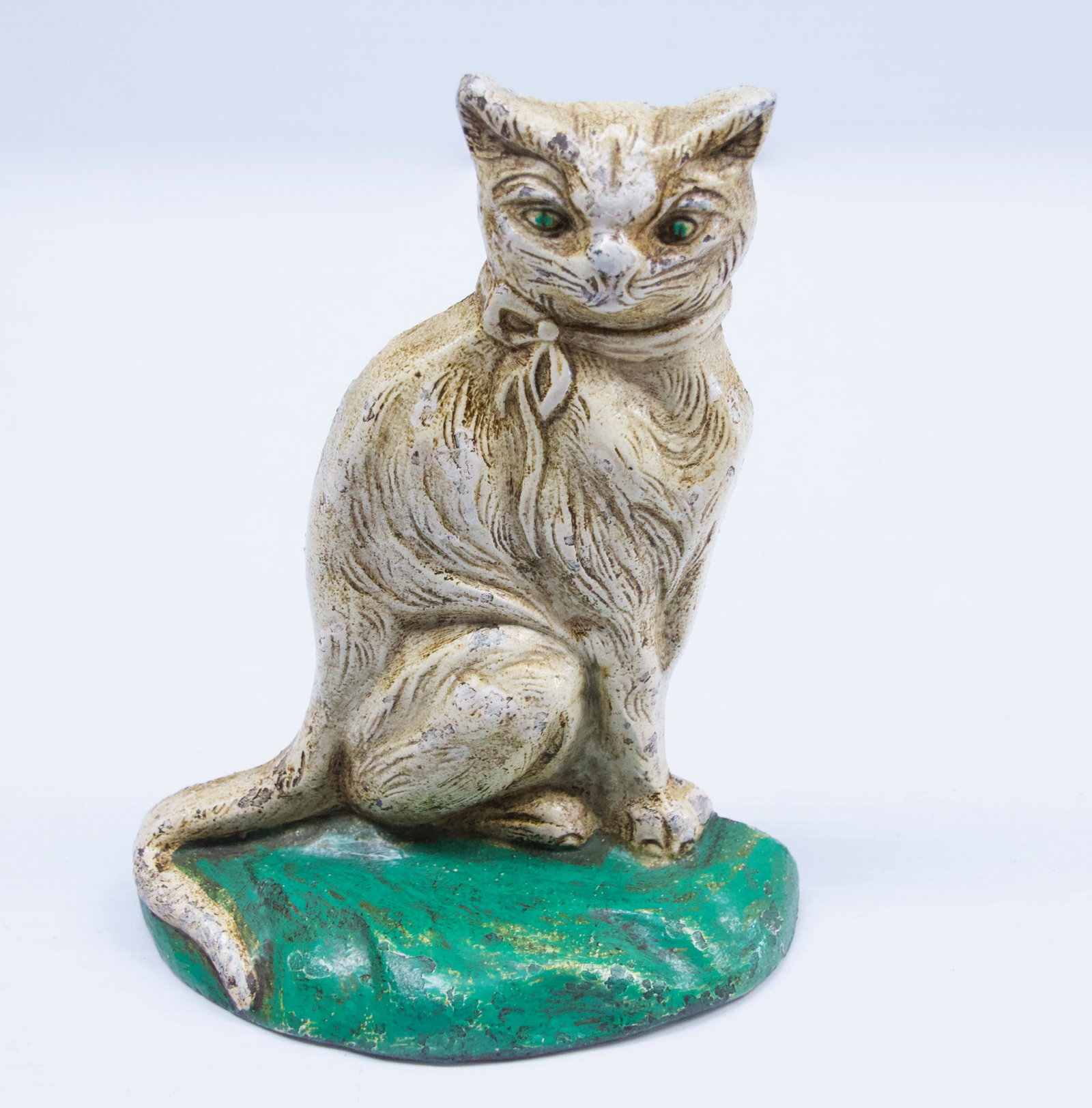 CAST IRON CAT DOOR STOP: ANTIQUE CAT DOORSTOP IN GREEN AND WHITE PAINT - UNSIGNED Dimensions: 6 1/2" H